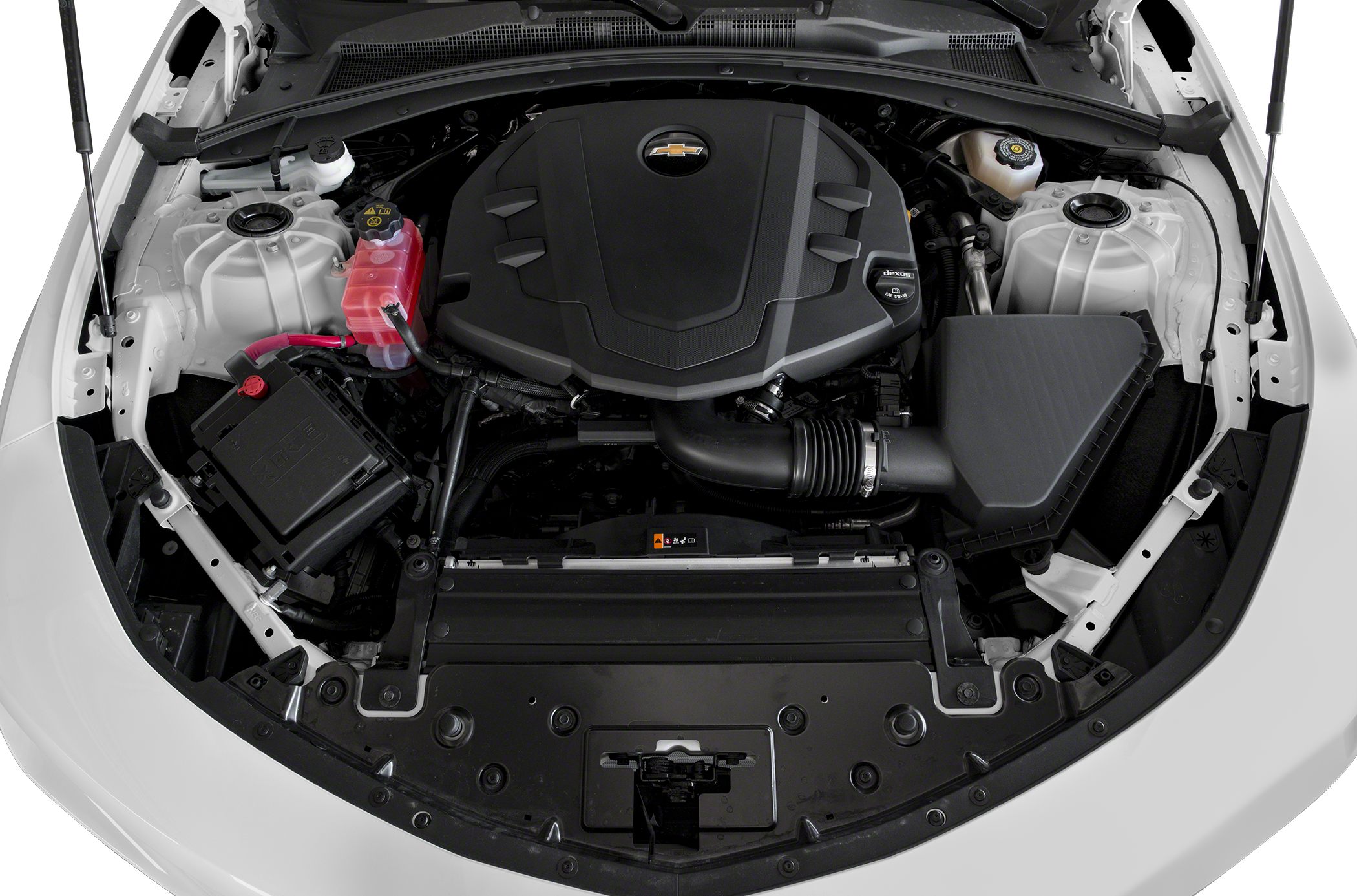 Engine bay with black plastic engine cover and intake components