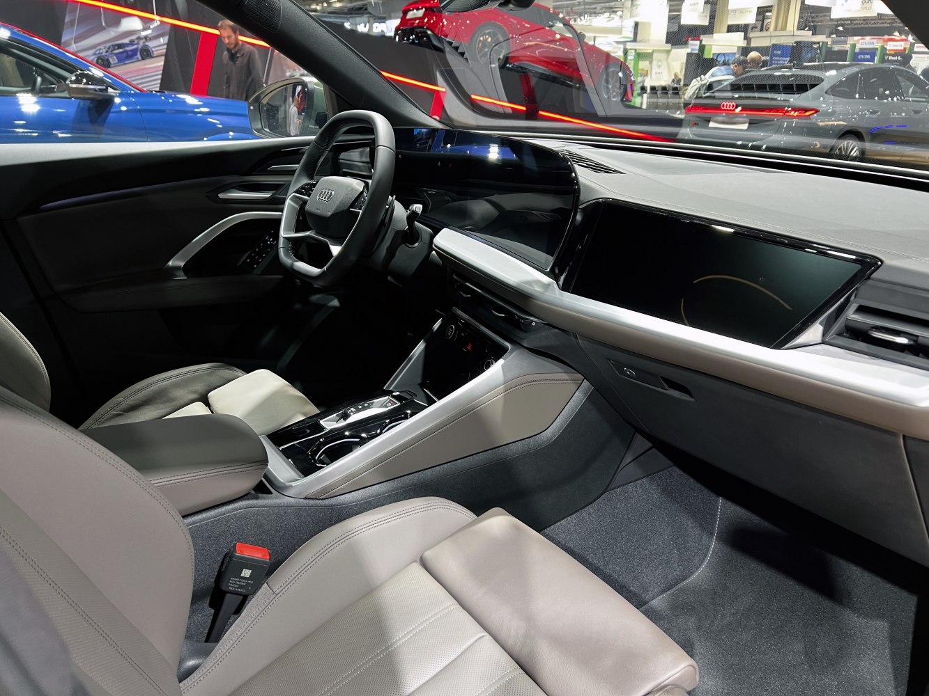 Digital cockpit and modern steering wheel with luxury front seats