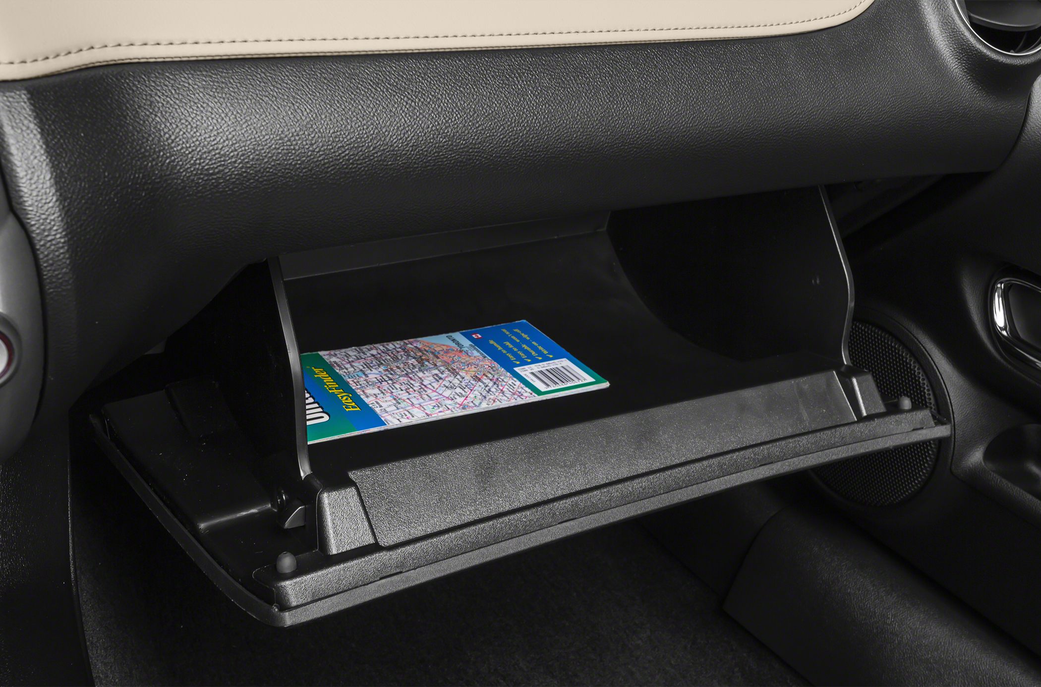 Glove compartment with car manual inside convertible interior