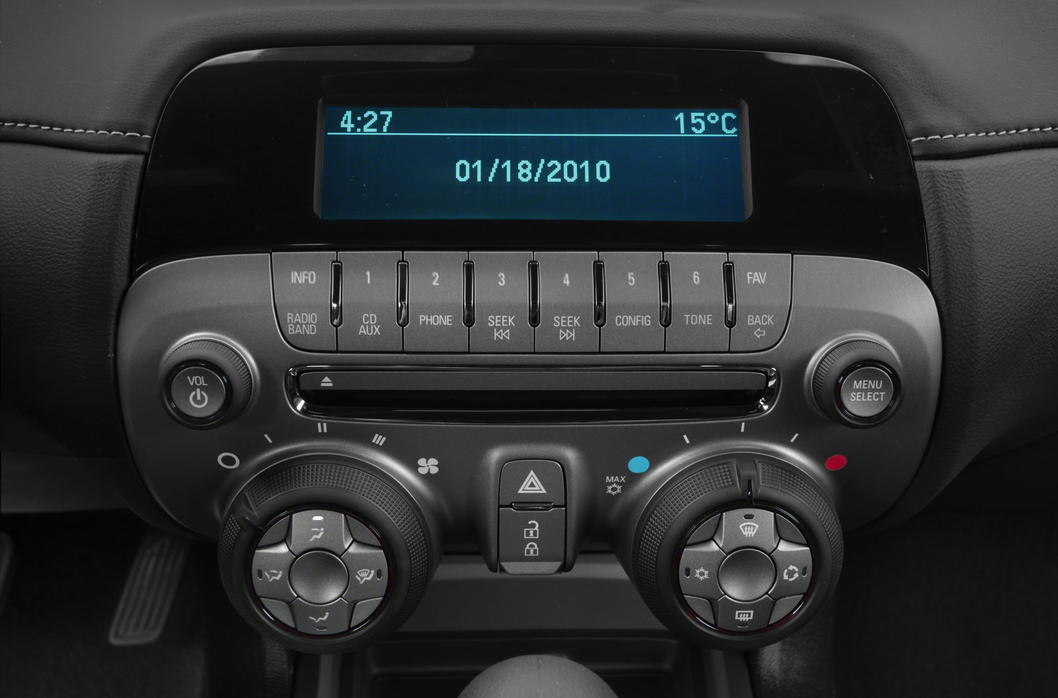 Infotainment screen and climate control knobs with buttons