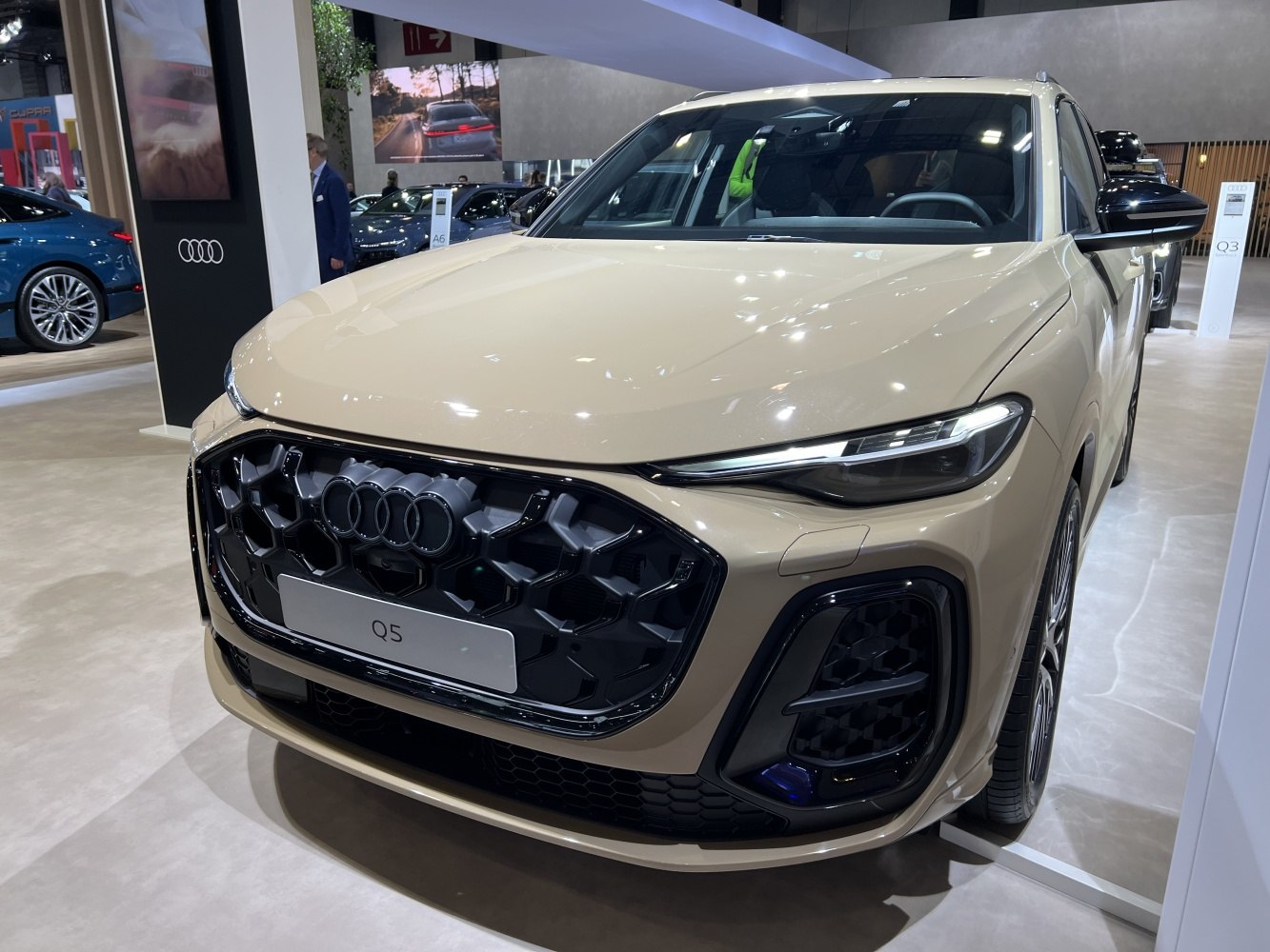 Bold front grille and sleek LED headlights of a modern SUV.