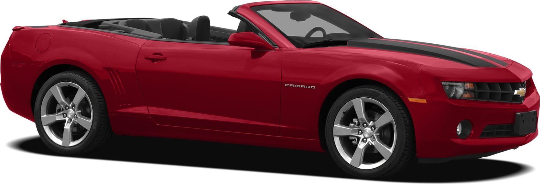 Red convertible with black hood stripes and alloy wheels