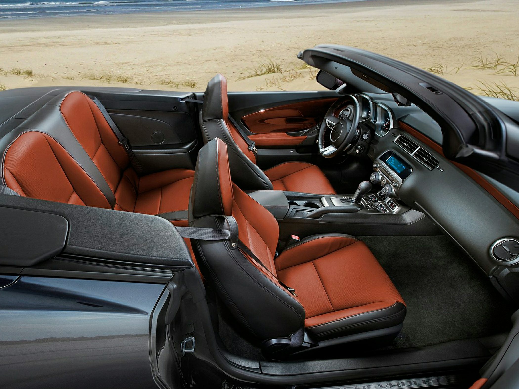 Convertible interior with sport seats and detailed dashboard