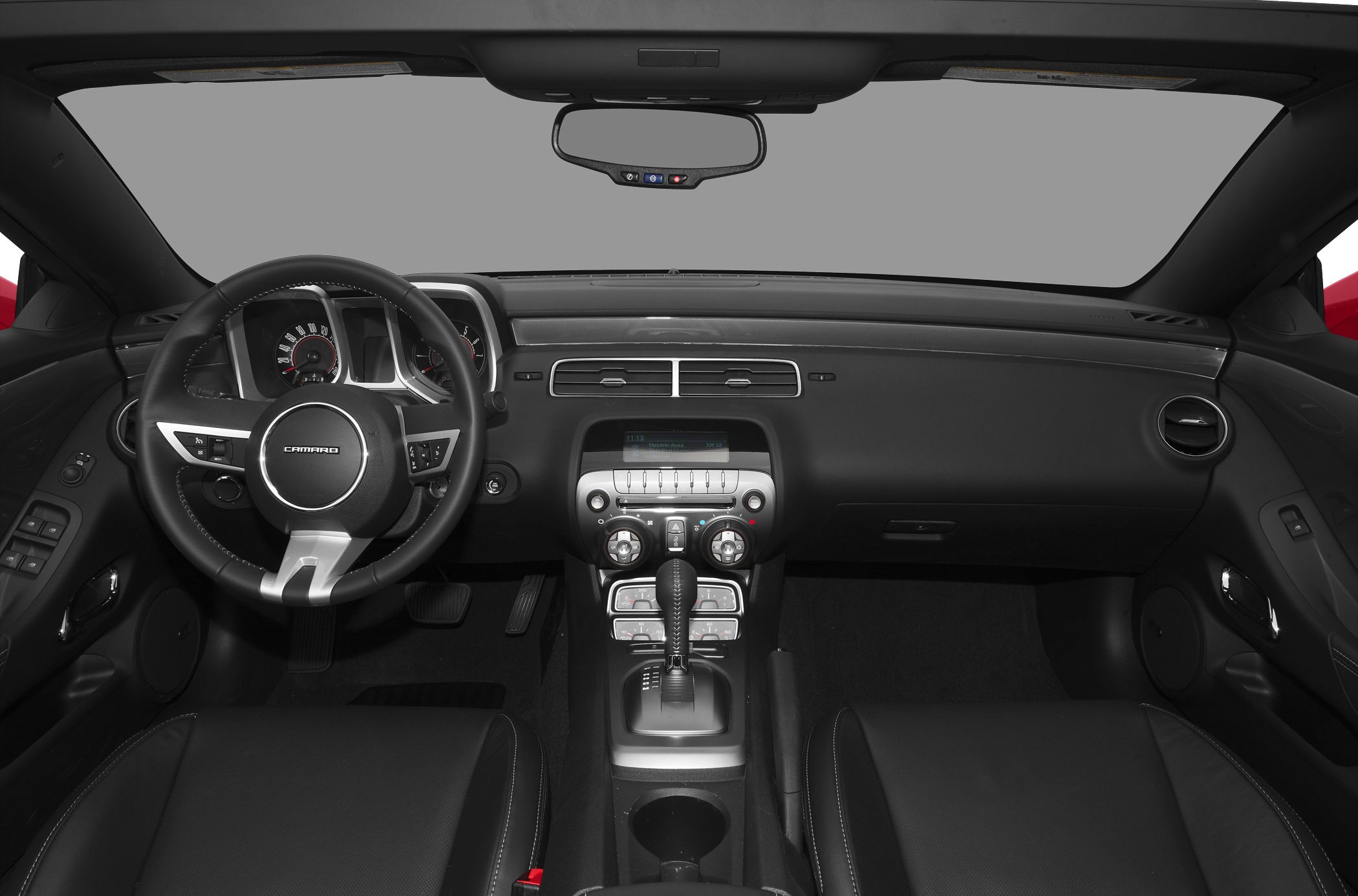 Interior dashboard and steering wheel with instrument cluster and gear shift