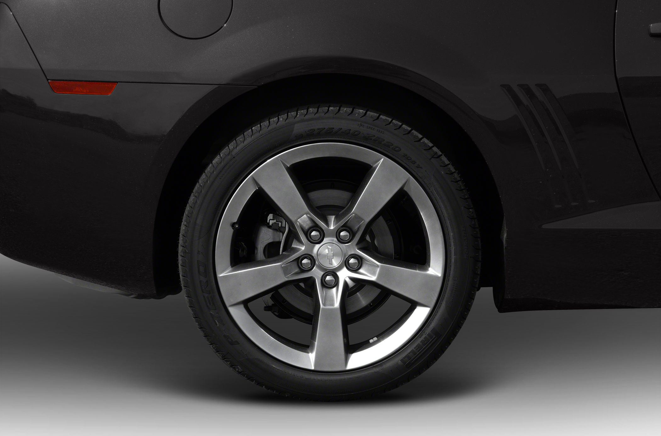 Close-up of alloy wheel and rear quarter panel