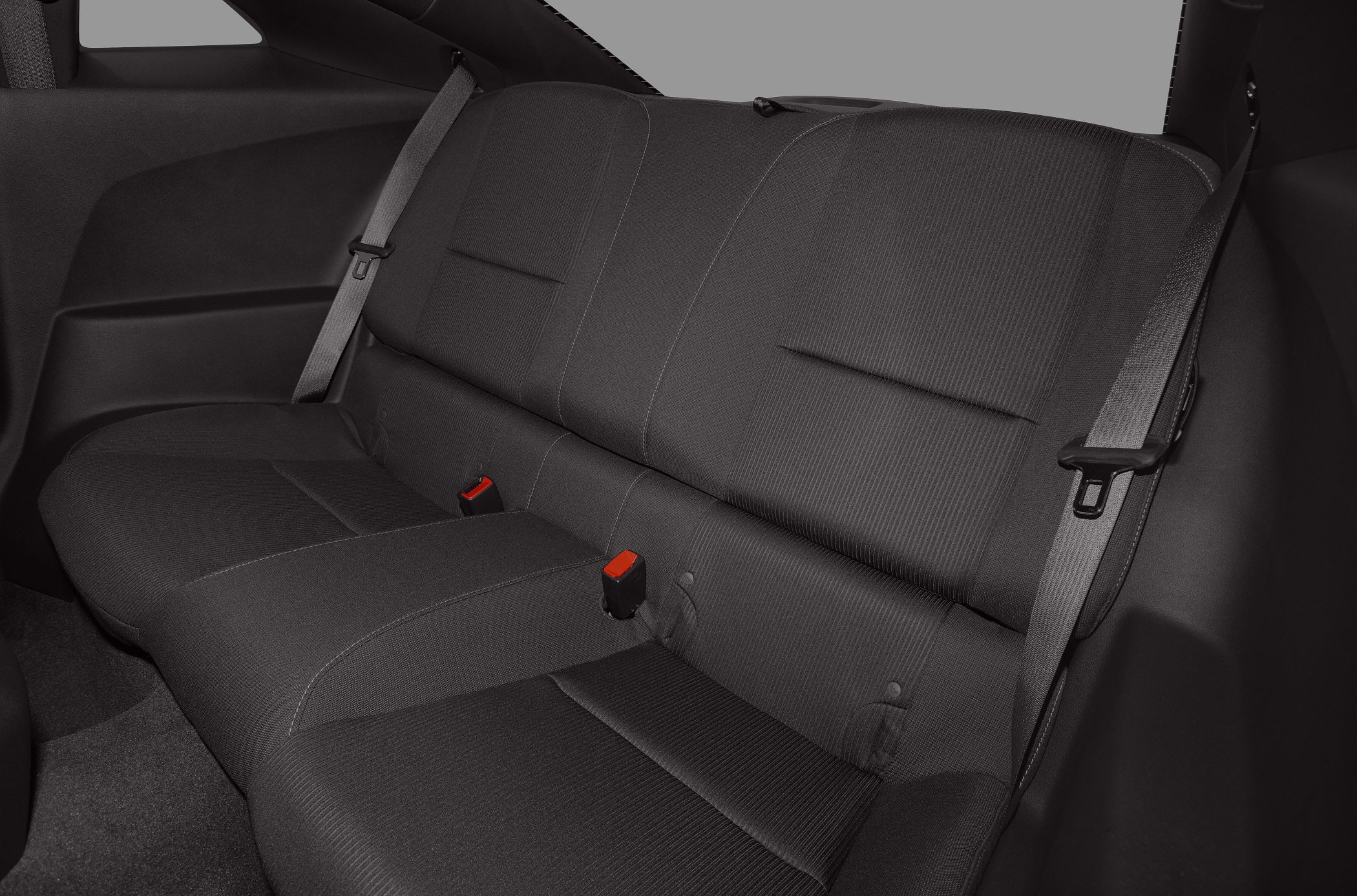 Back seat with fabric upholstery and integrated seat belts