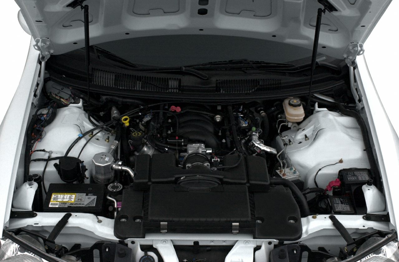 Detailed engine bay with visible V8 layout and components