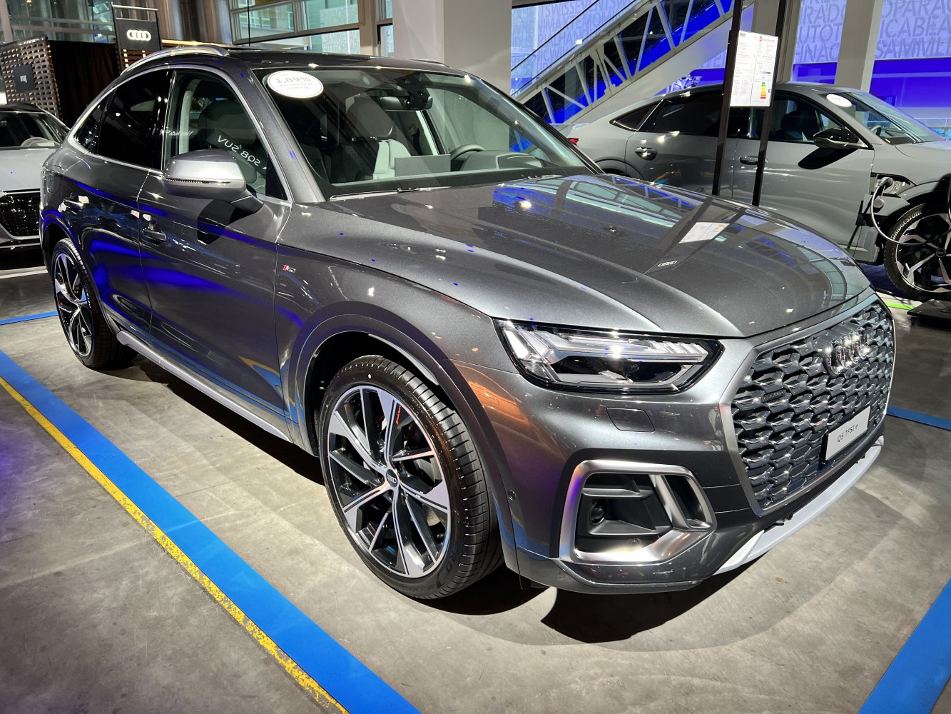 Front and side view of a modern SUV with distinctive grille and sporty wheels