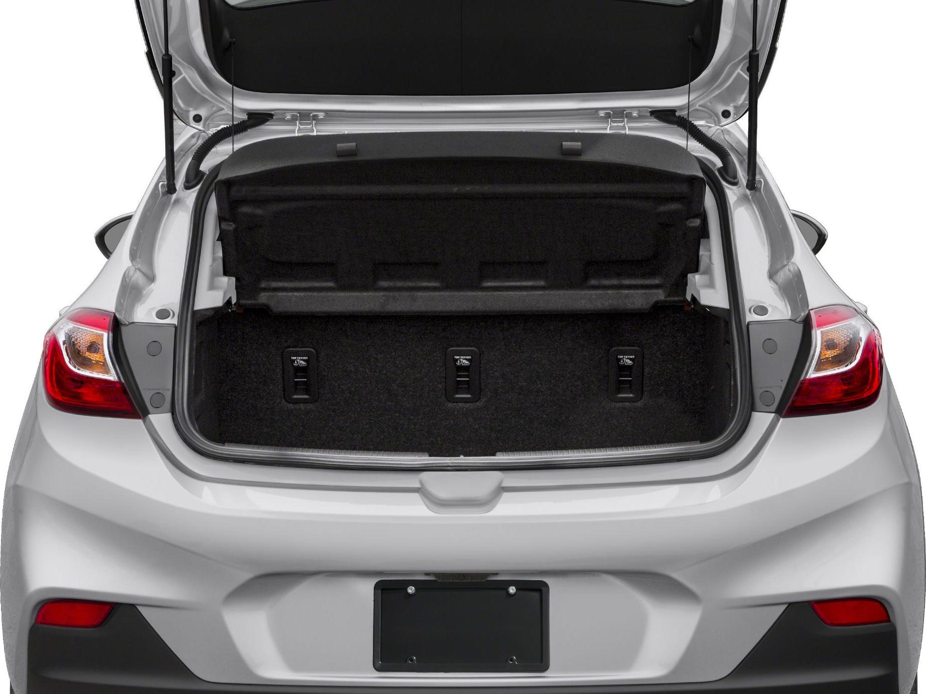 Open rear trunk space of a hatchback with visible interior hooks