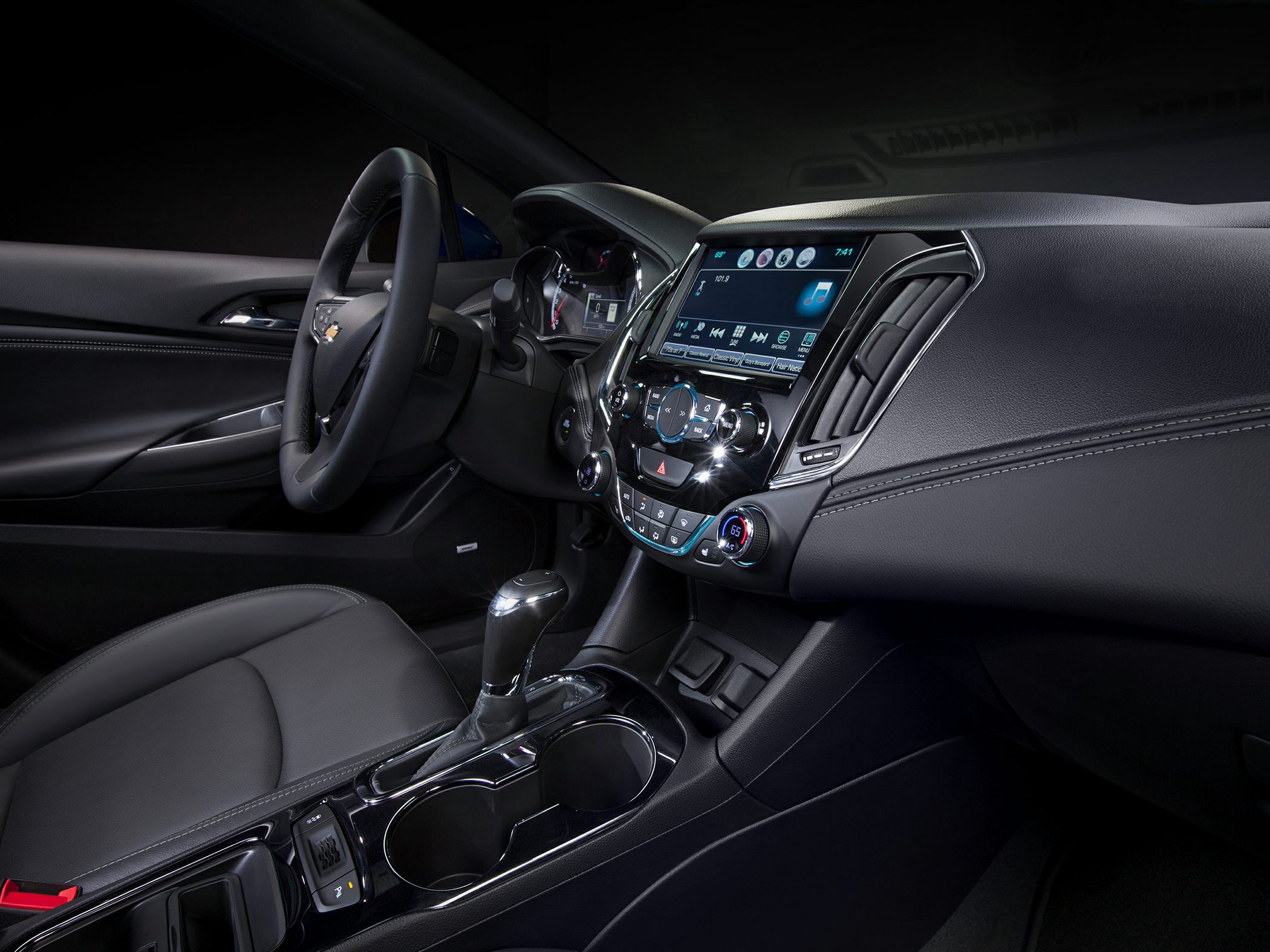 Touchscreen display and modern dashboard controls with gear shift and climate control