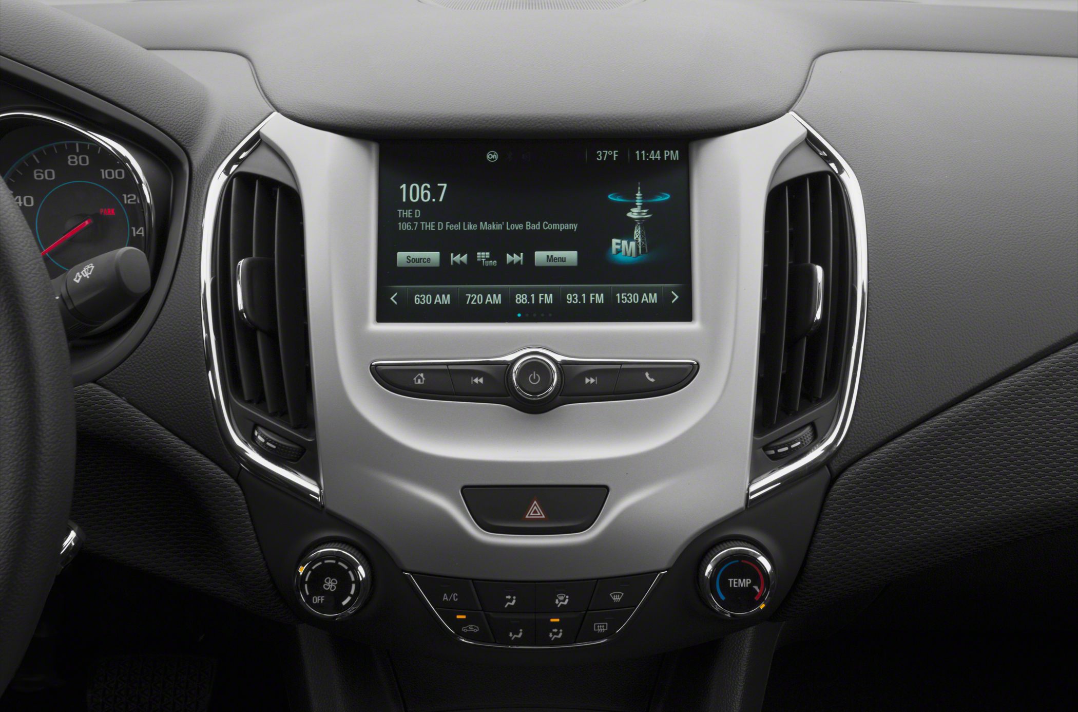 Dashboard with central infotainment screen and climate control knobs