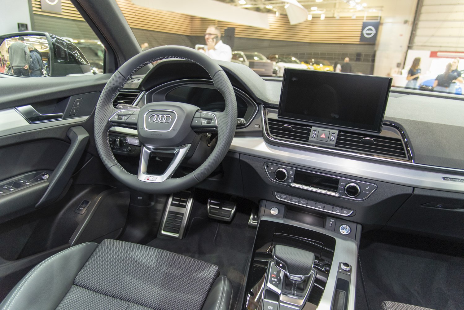Modern car dashboard and multifunction steering wheel