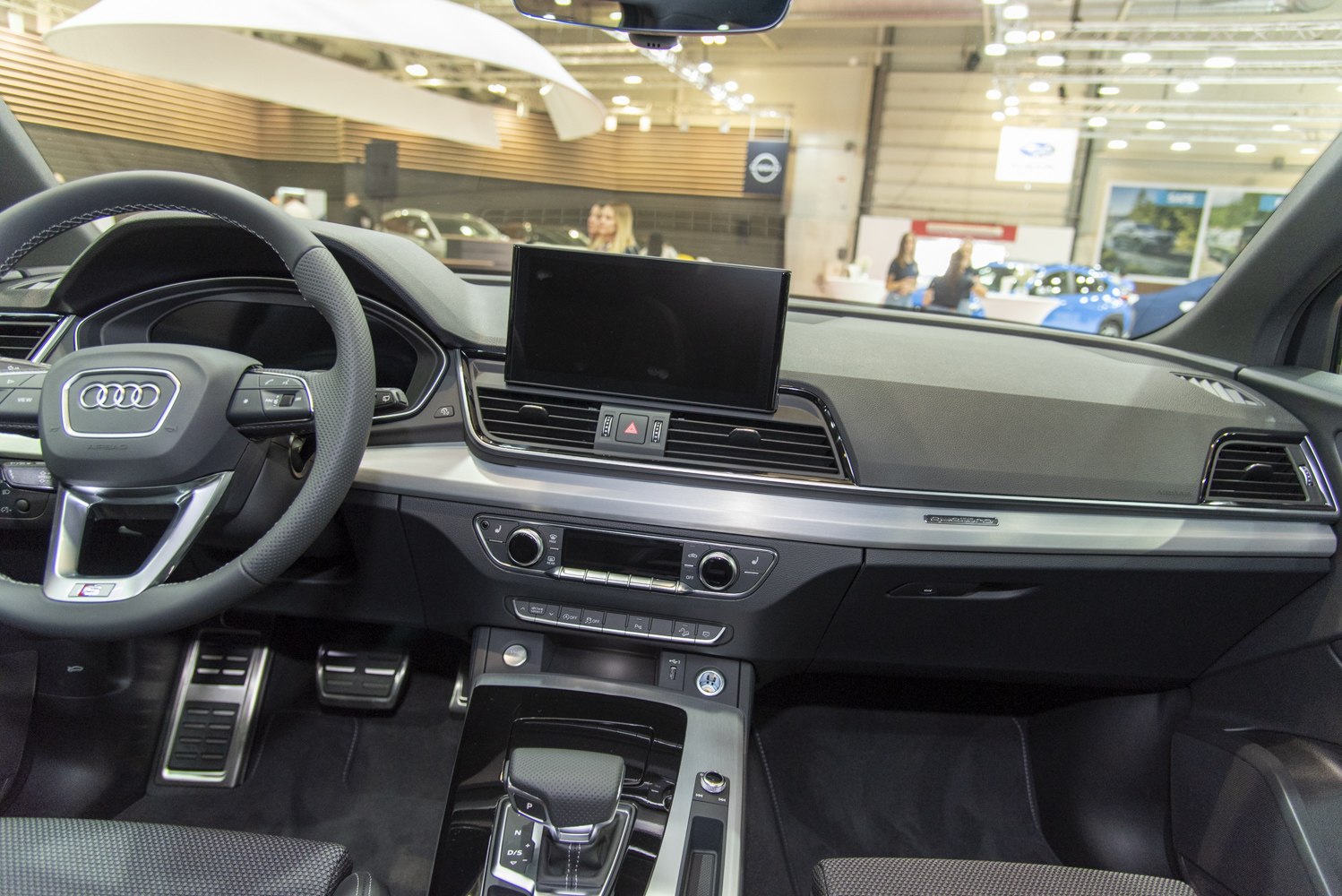 Audi-style dashboard with central infotainment display and control panel