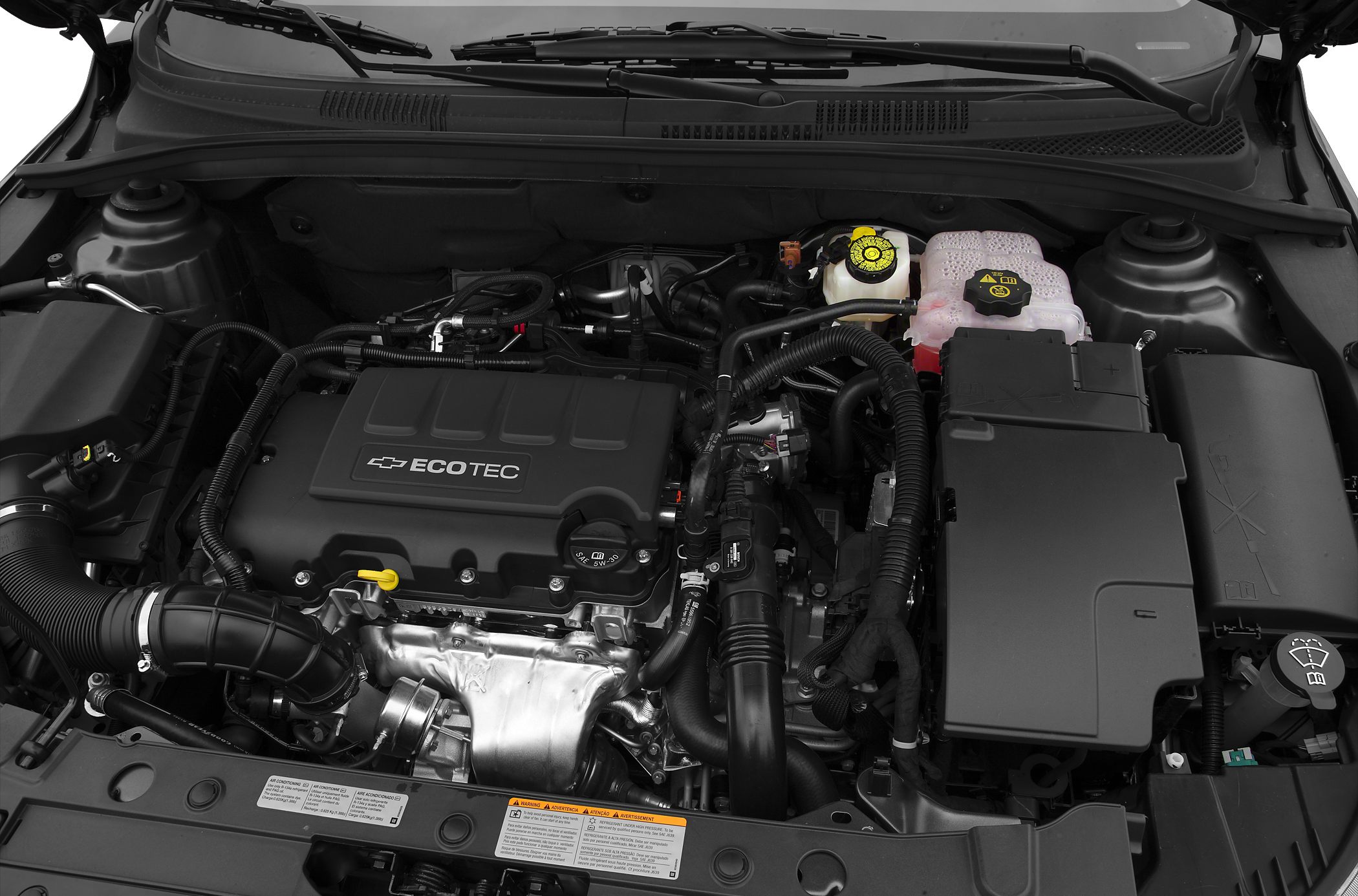Engine bay of a sedan with Ecotec engine and visible components