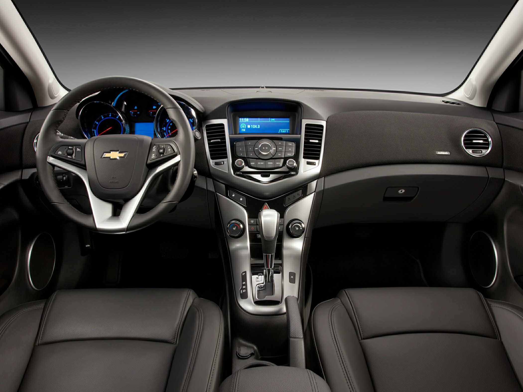 Steering wheel and central dashboard console with controls and display