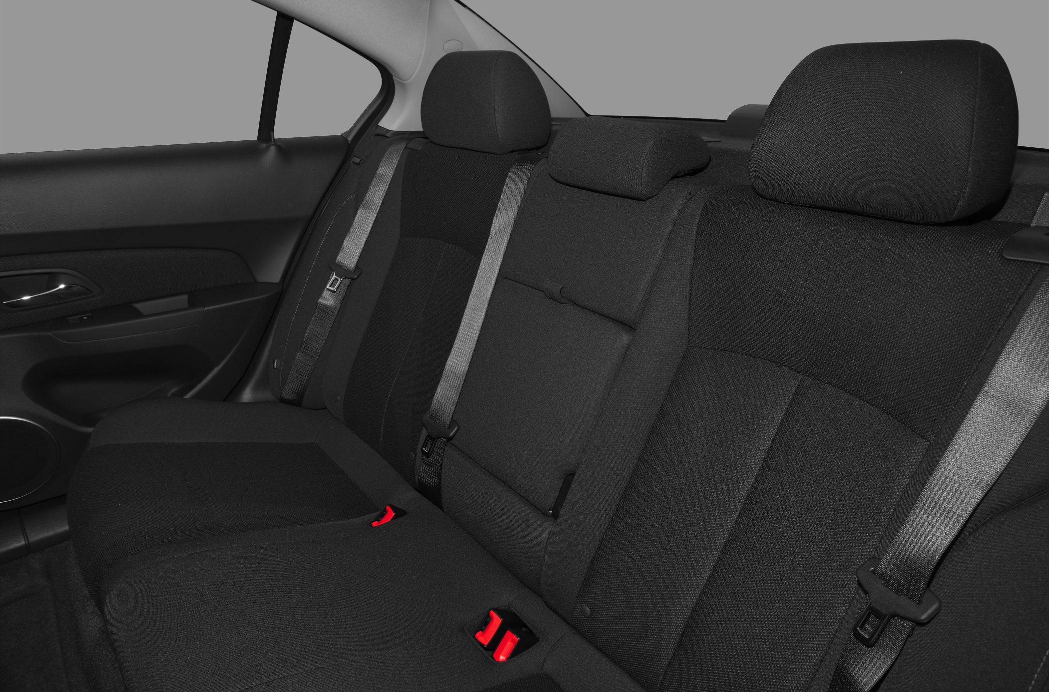 Rear seat fabric interior with integrated seat belts and headrests