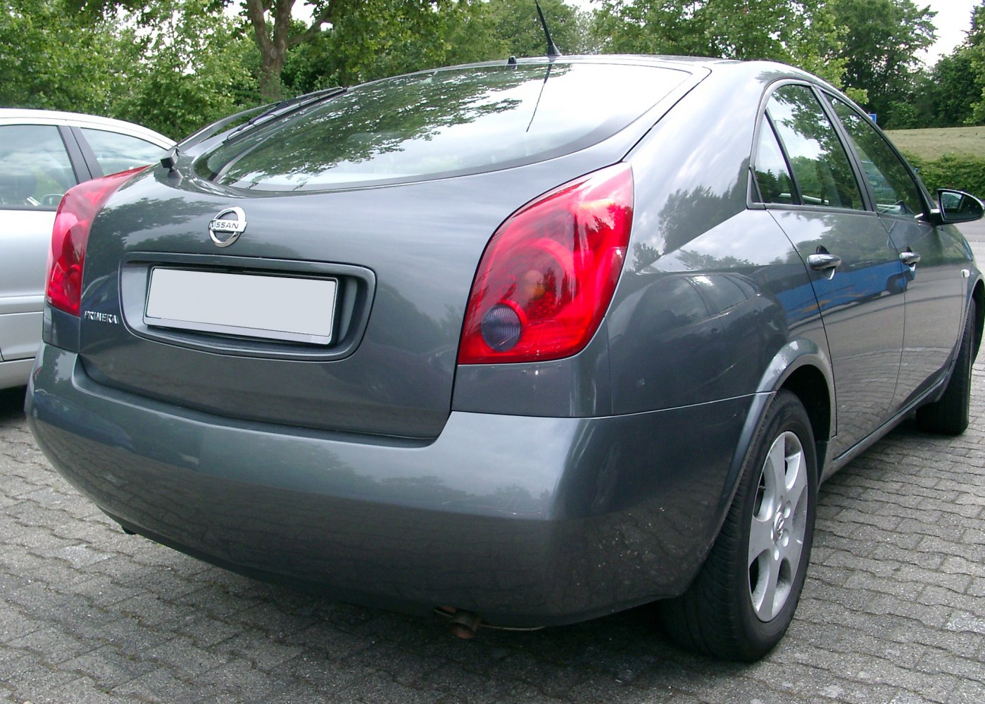 Rear view of a hatchback with distinctive red taillights and a smooth rear bumper