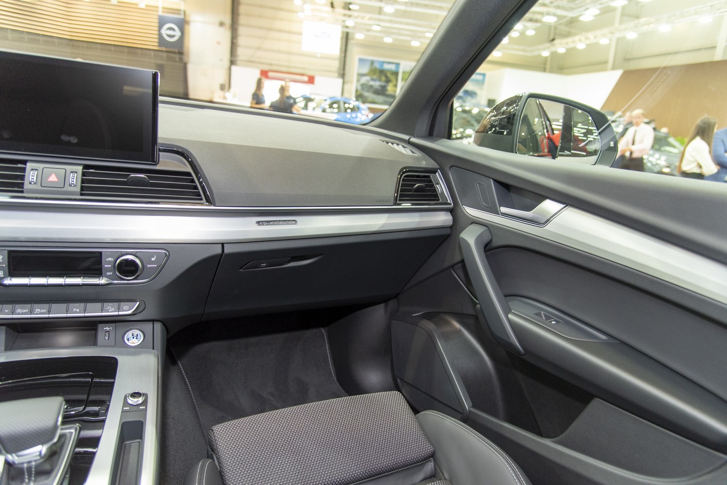 Modern car interior with dashboard and door panel