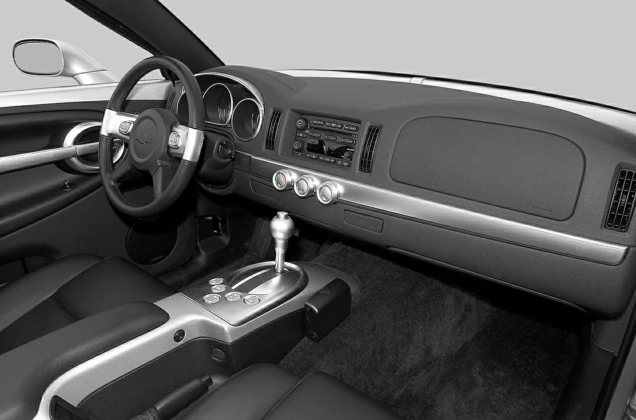Interior dashboard and center console with steering wheel and gear shifter