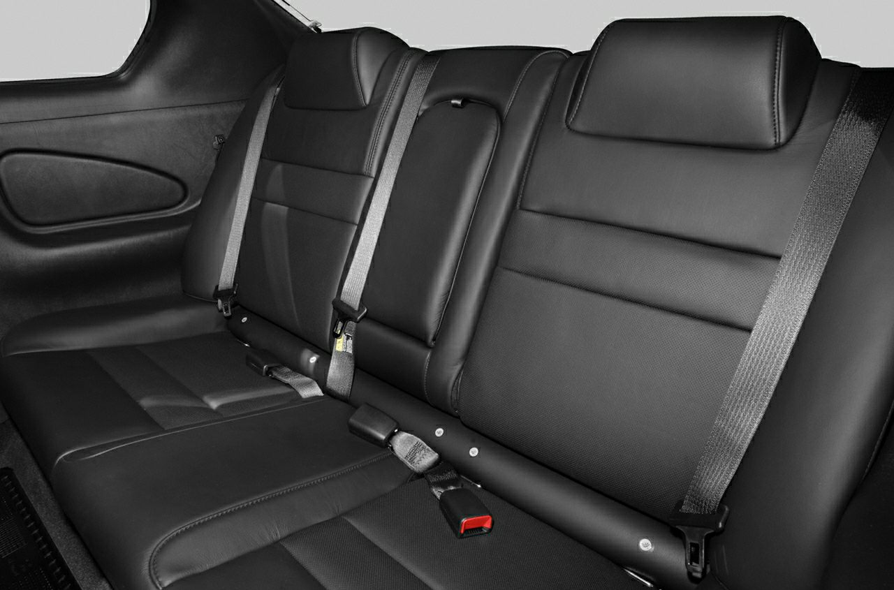 Black leather rear seats with integrated seat belts and headrests