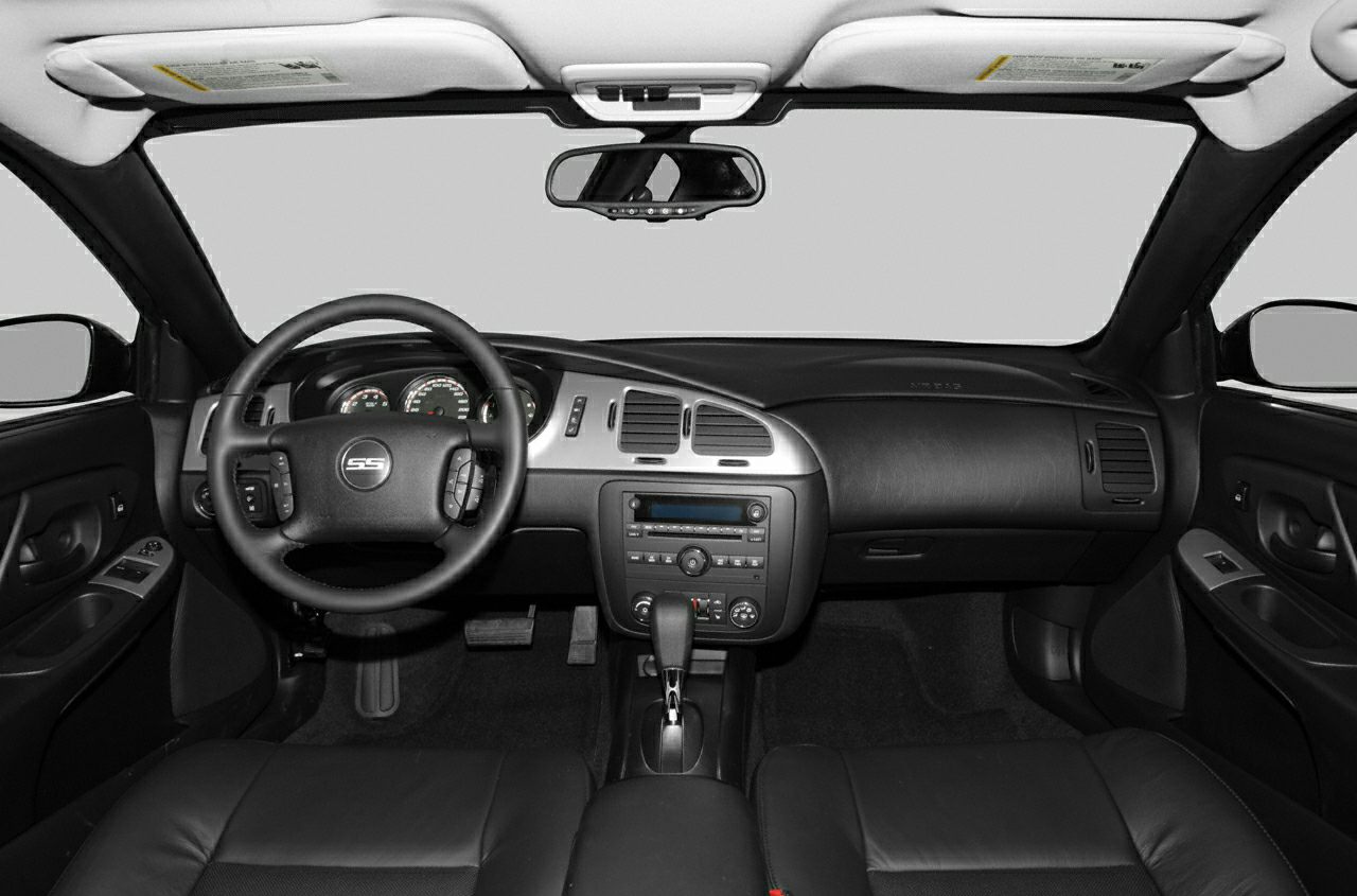 Interior dashboard and SS steering wheel with center console.