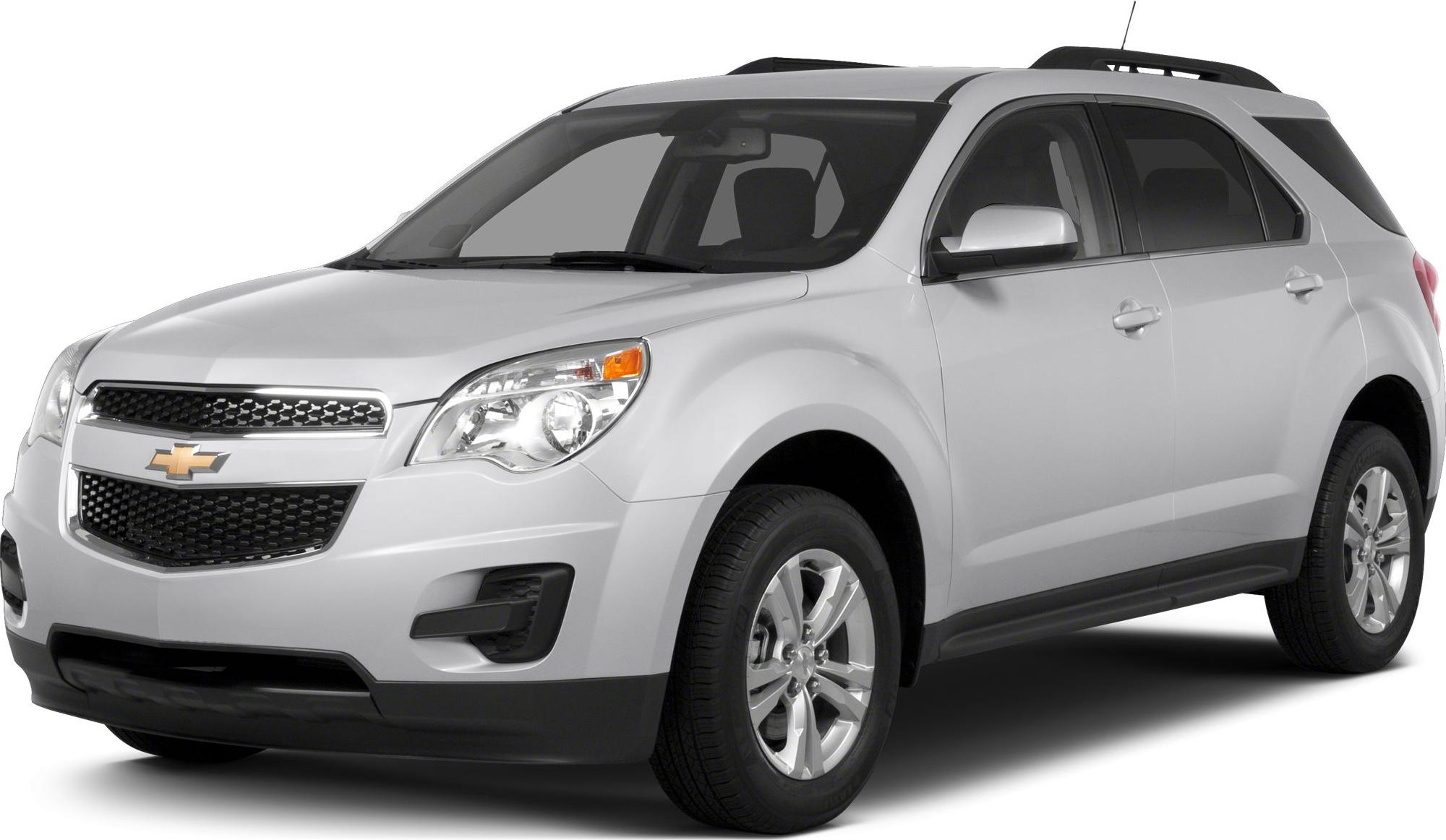 Front side view of silver SUV with grille and alloy wheels