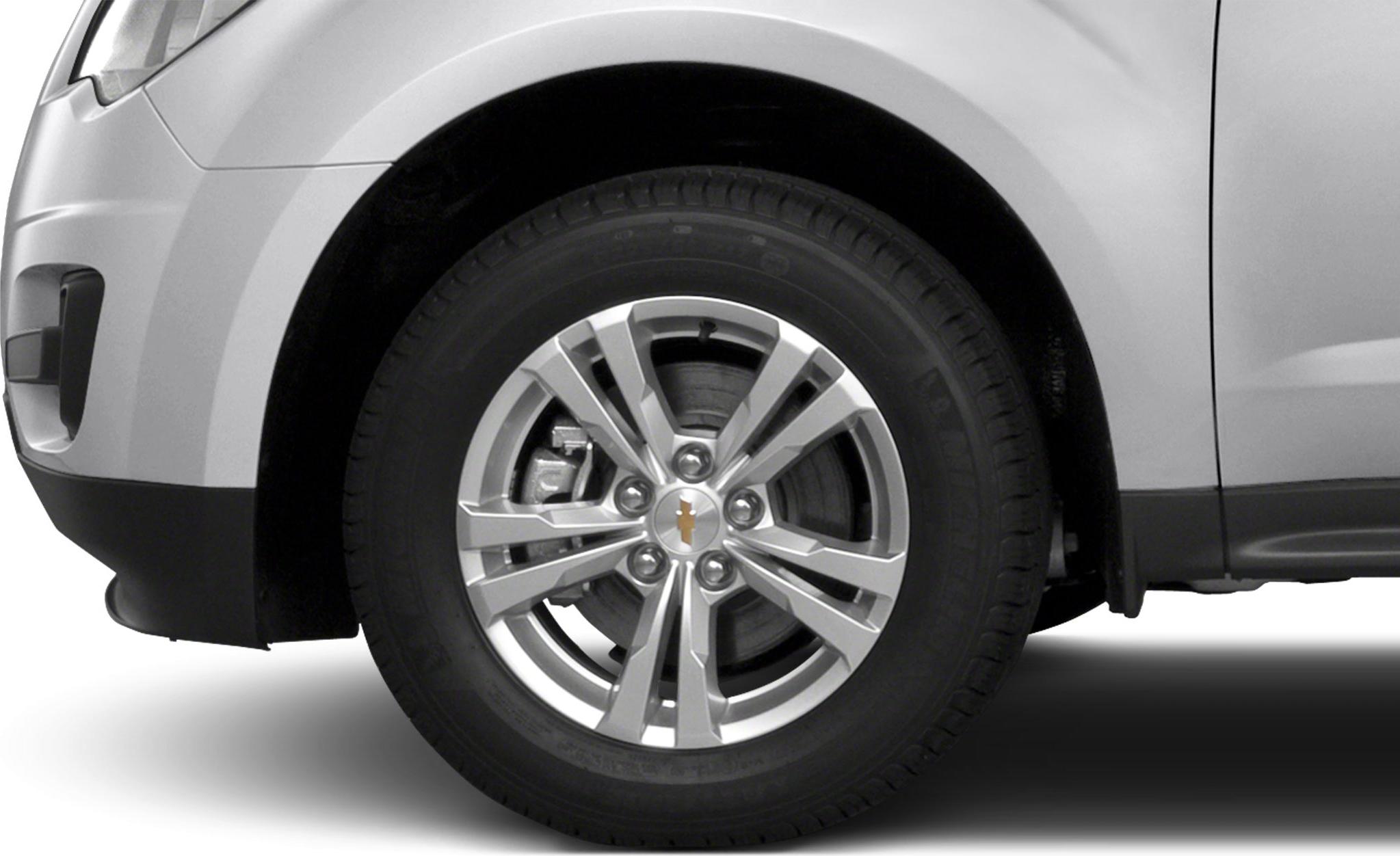 Alloy wheel and front fender with tire and disc brake detail