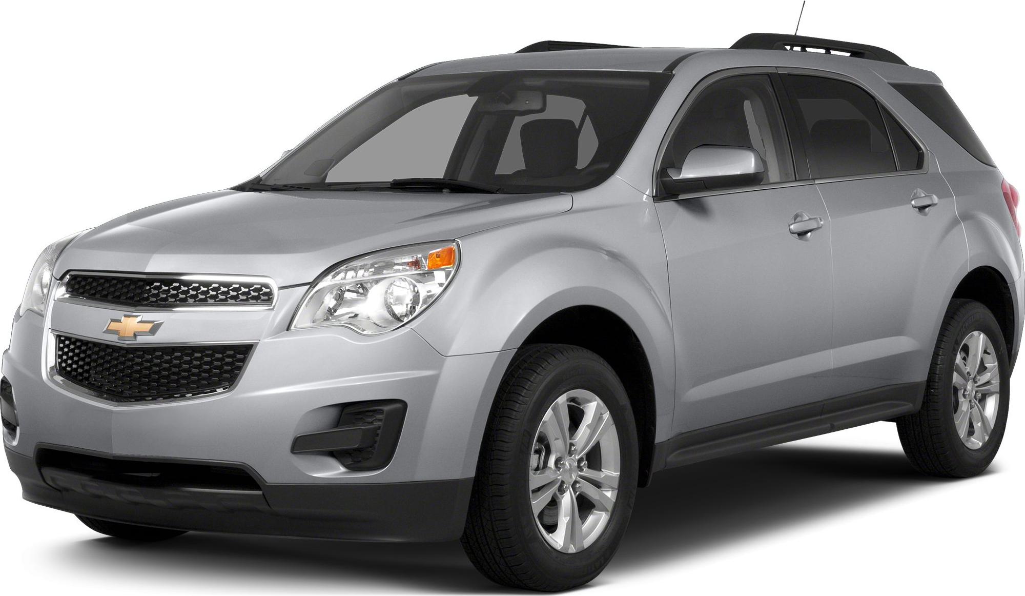 Front side view of silver SUV with alloy wheels and roof rails