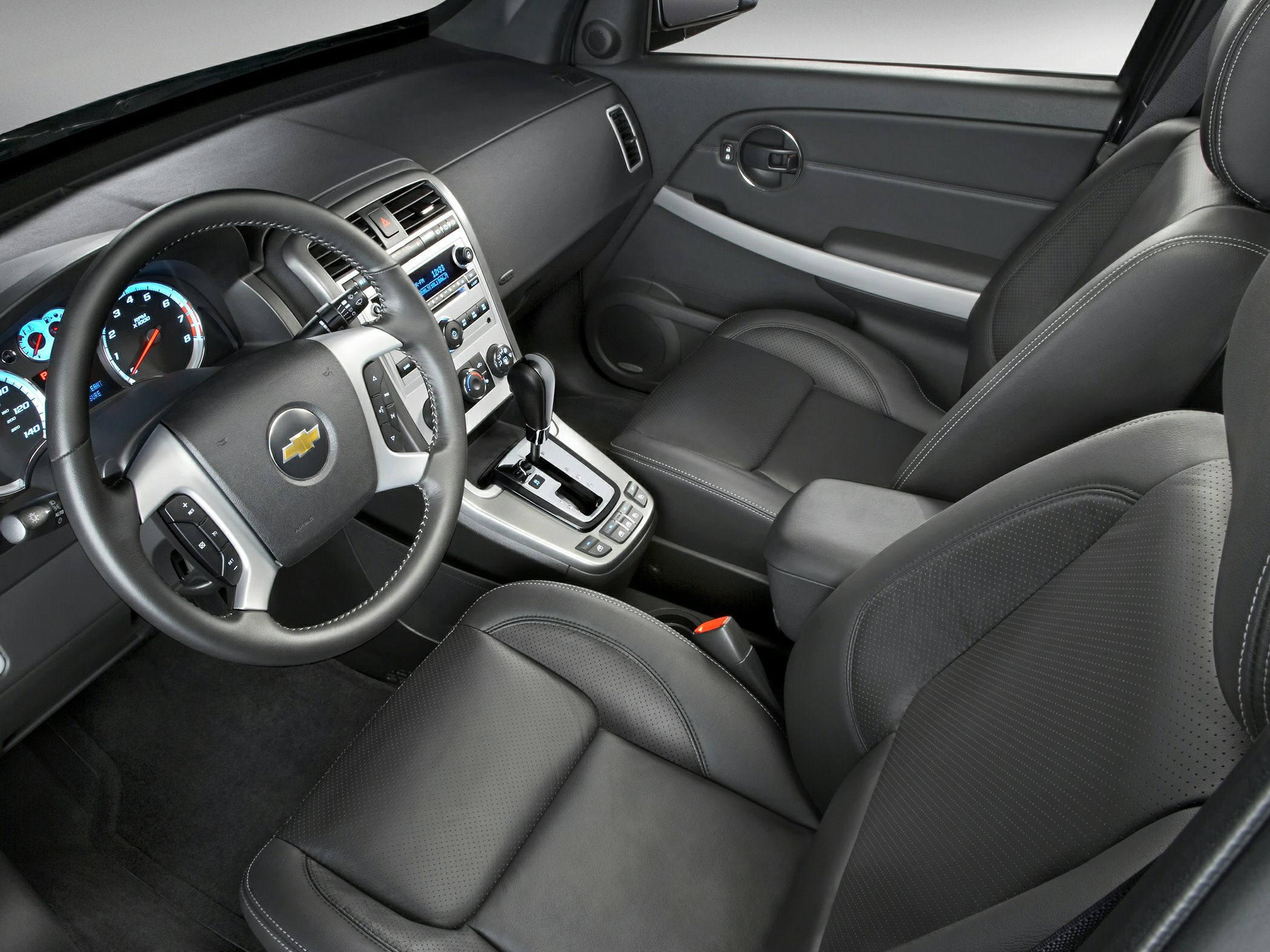 Black leather seats, steering wheel, dashboard with controls