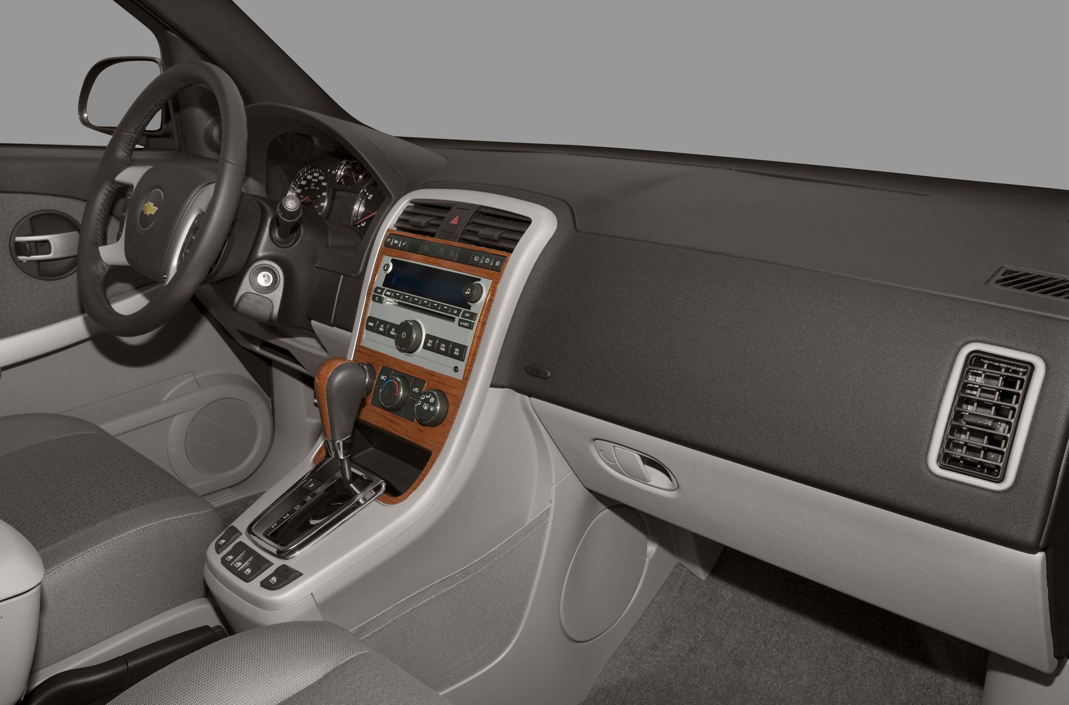 SUV interior with wood trim center console and automatic gear shift
