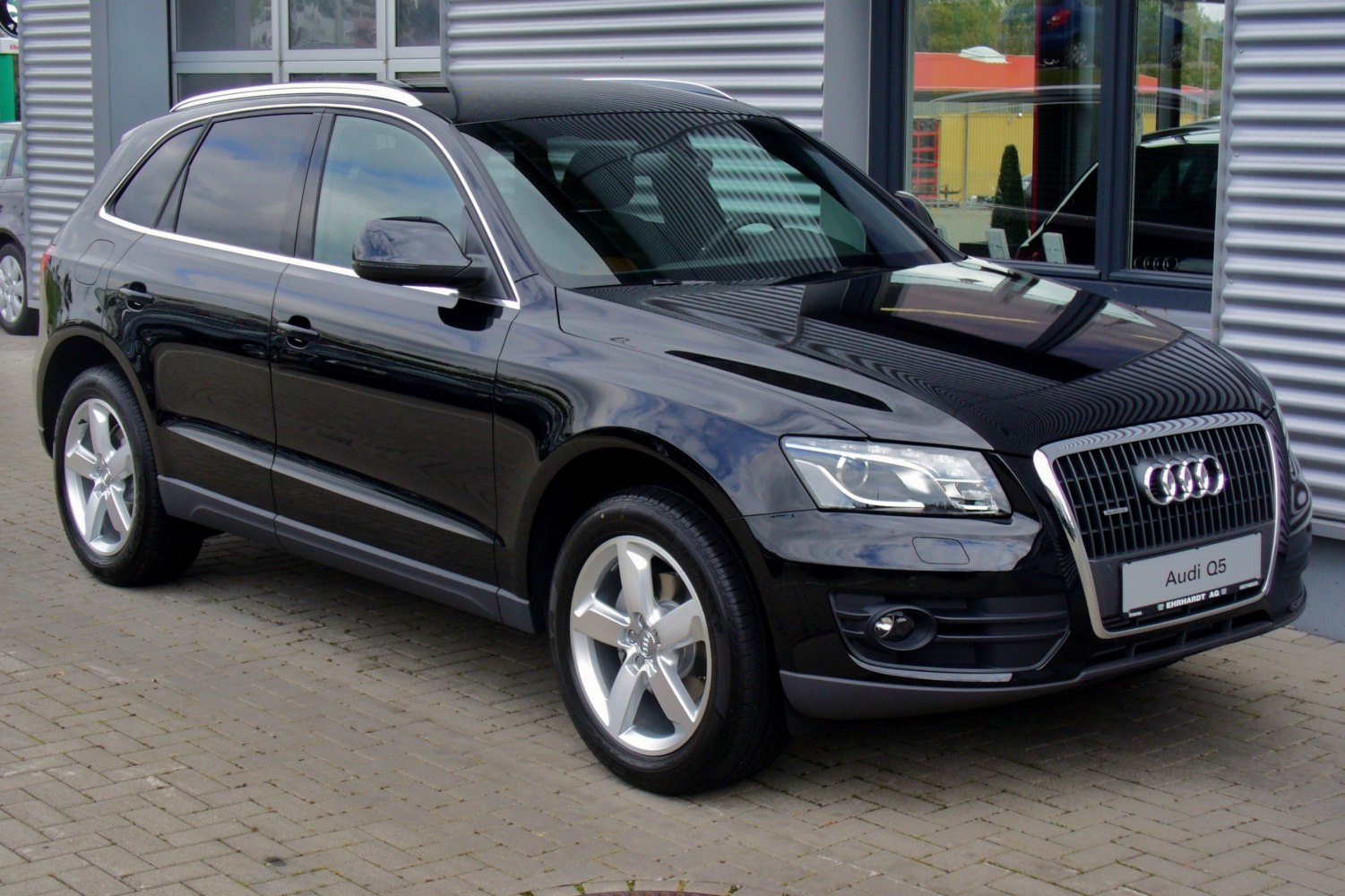 Black SUV with LED headlights and alloy wheels
