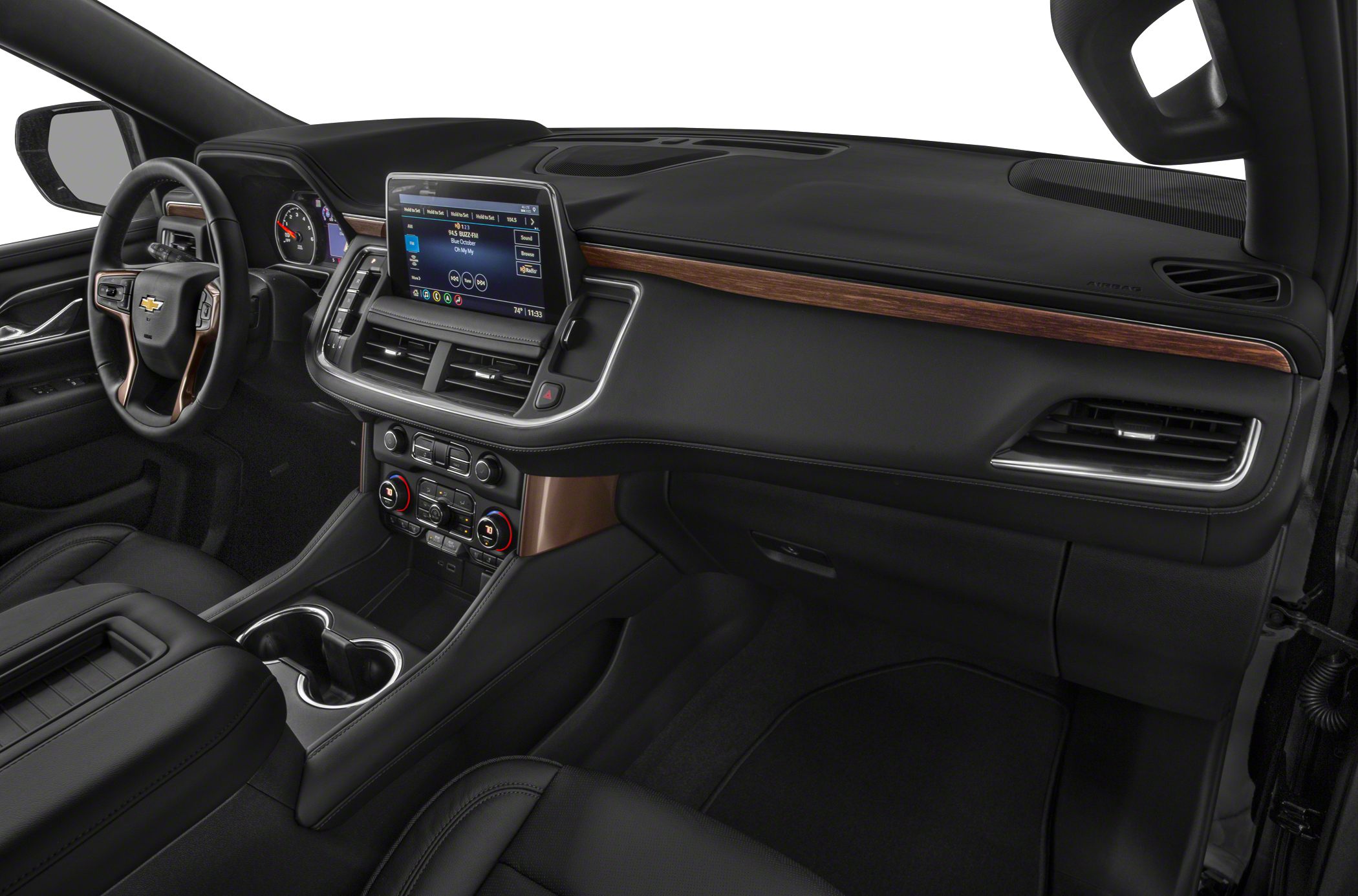 Touchscreen infotainment, wood trim dashboard, black leather seats, and multi-control panel