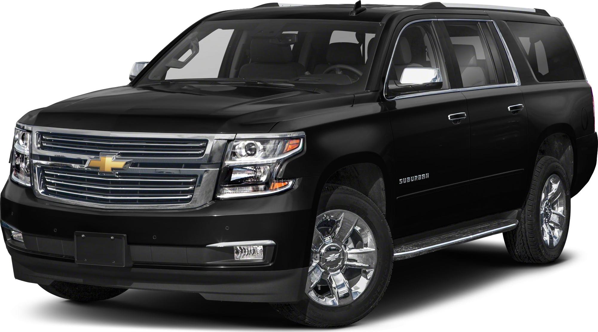 Front side view of black full-size SUV with chrome grille and shiny wheels