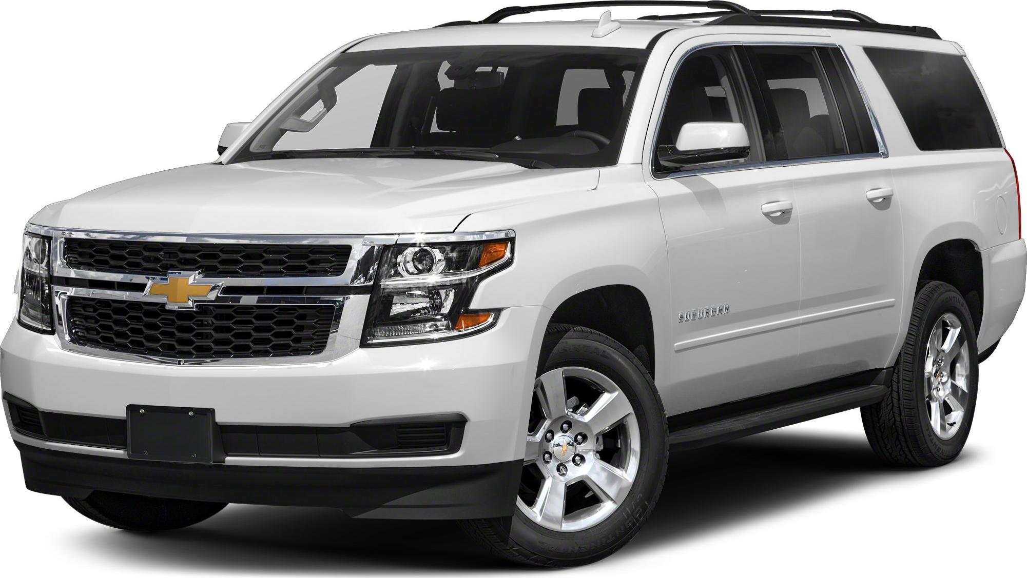 Front three-quarter view of a large full-size SUV with distinct grille and headlights