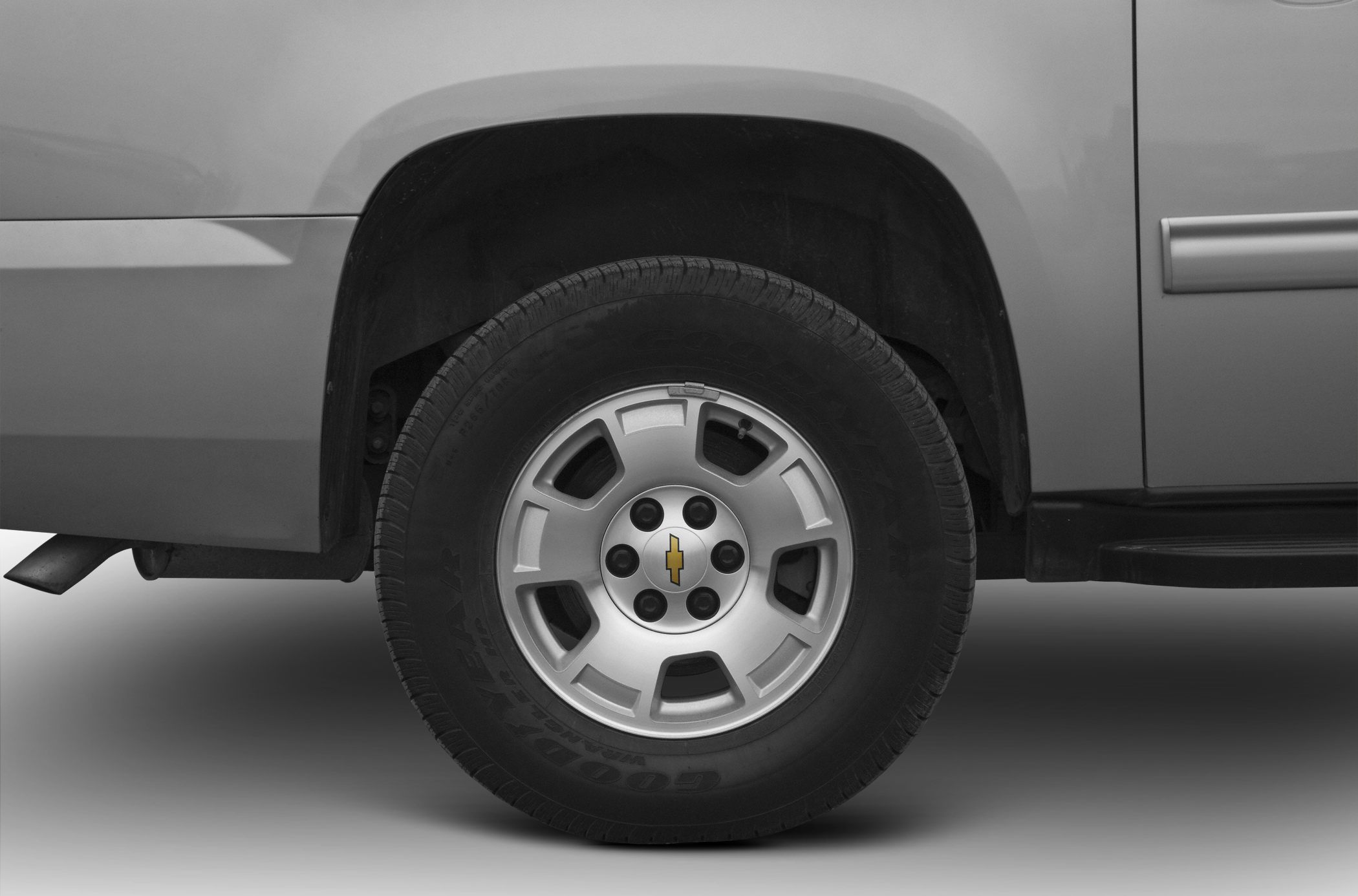 Alloy wheel and Goodyear tire close-up with Chevrolet emblem