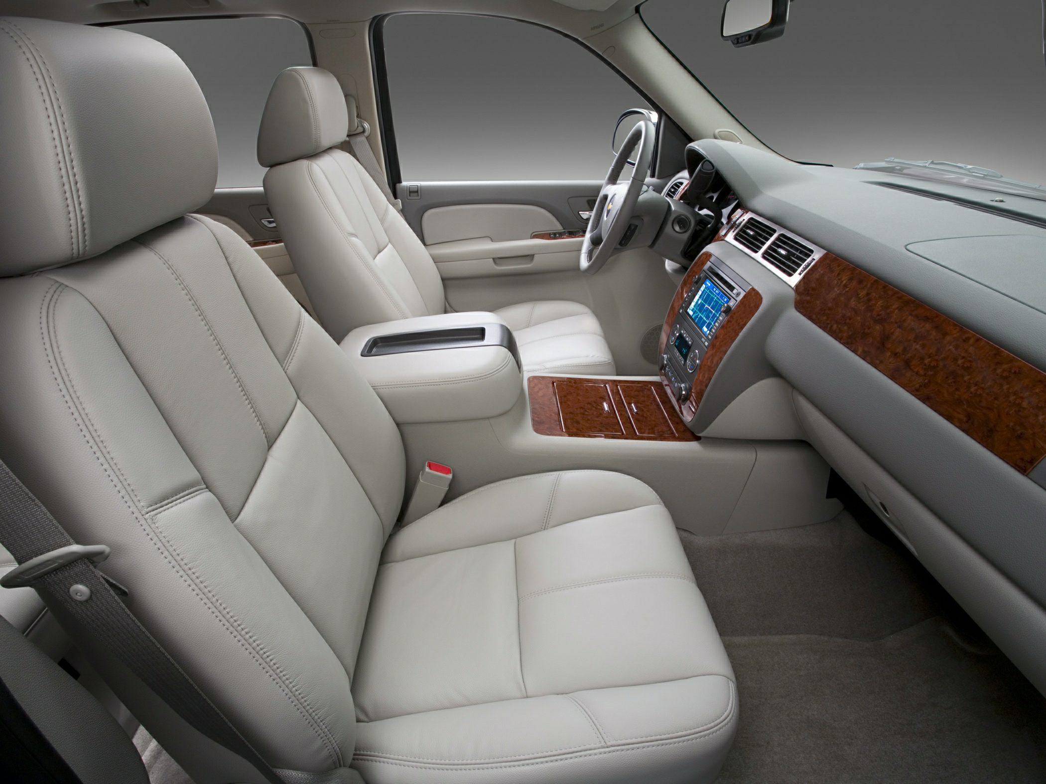 Leather seats with wood trim accents in SUV interior
