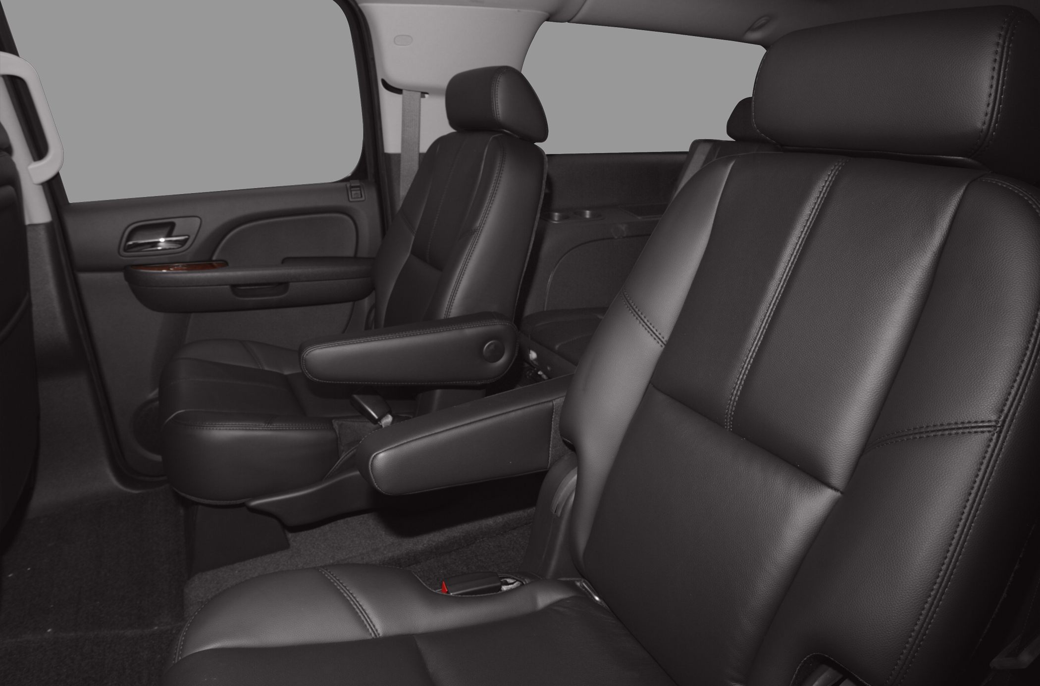 Luxury leather two-row seats with armrests and spacious cabin