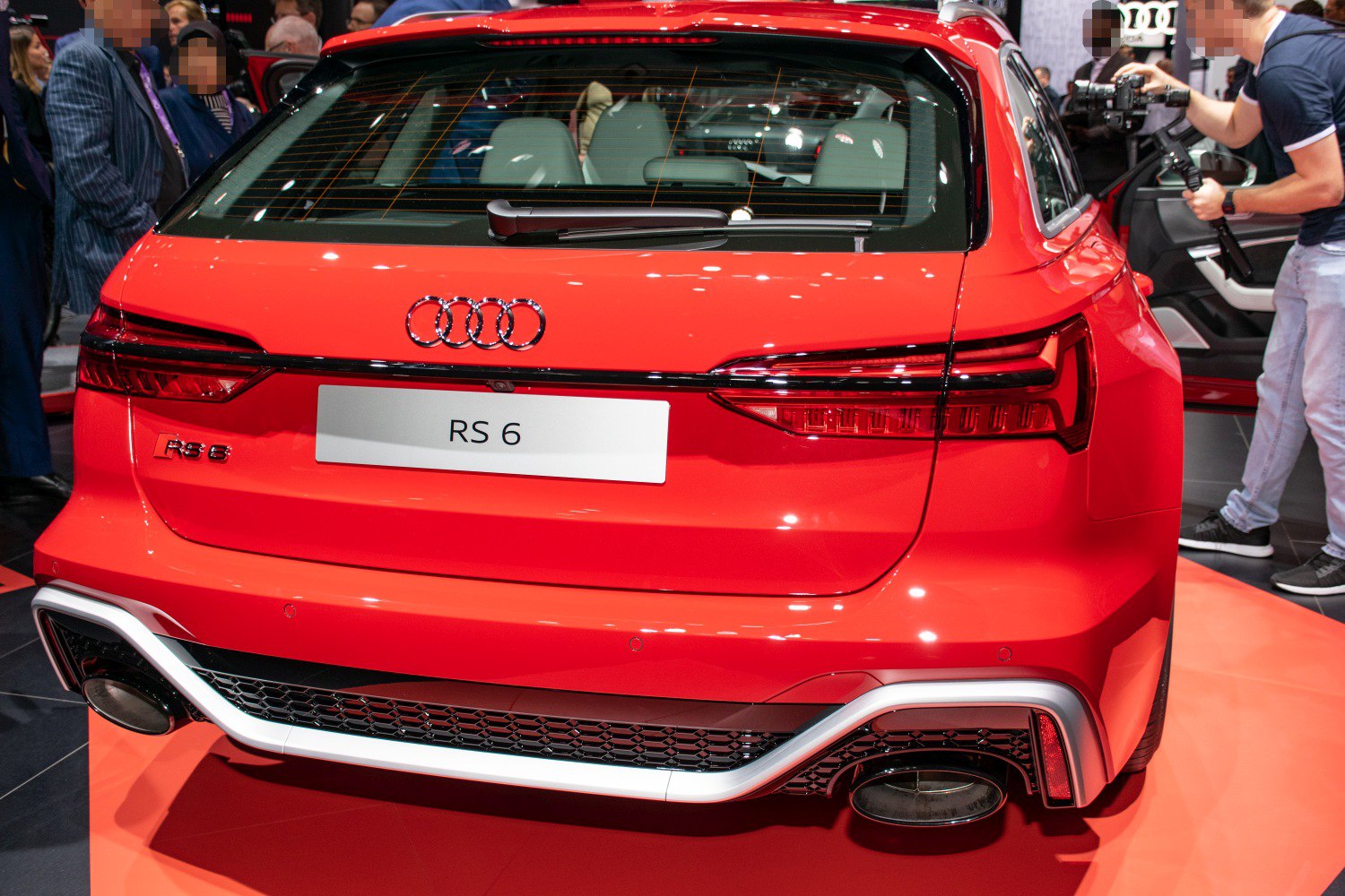 Red rear view with taillights and dual exhausts