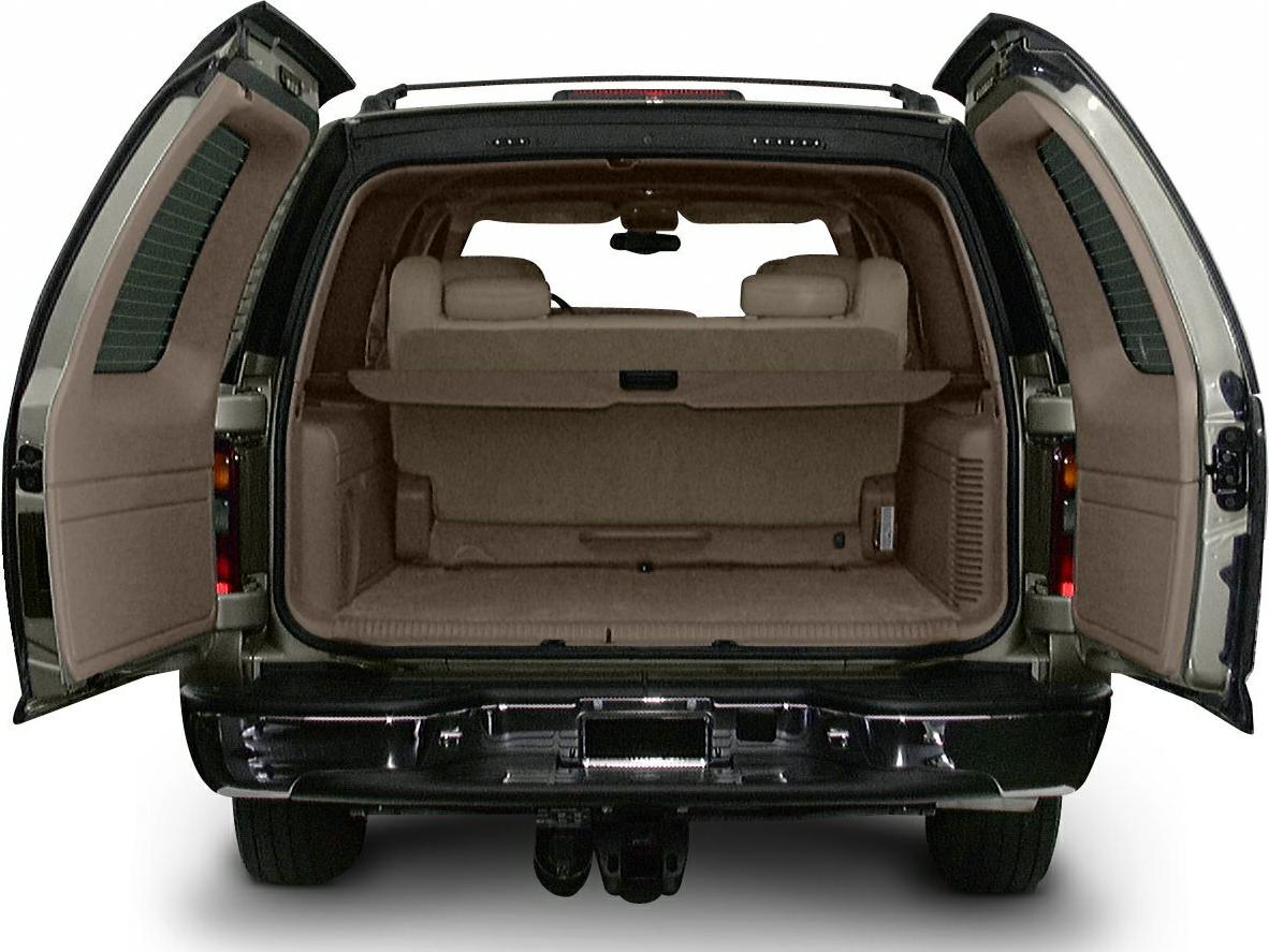 Spacious rear cargo area with split rear doors and visible rear seats