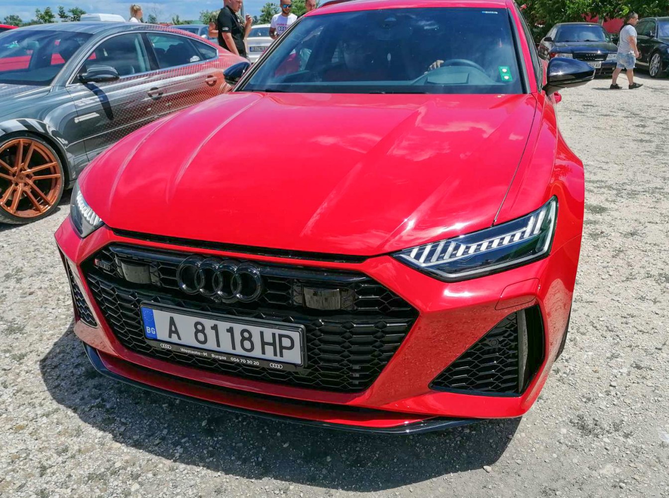 Close-up of front grille and LED headlights with aggressive sporty design