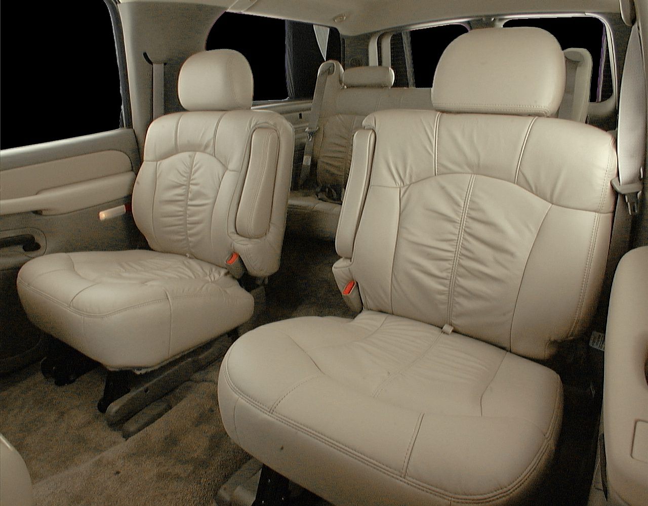 Tan leather second row seats in spacious SUV interior