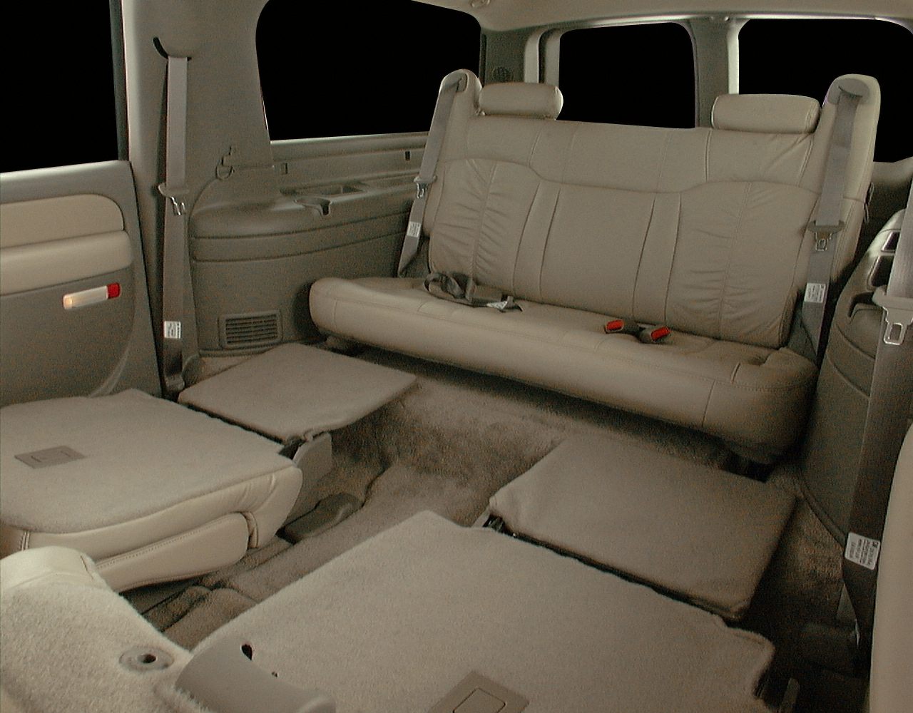 Spacious rear interior seating with foldable leather seats and seat belts
