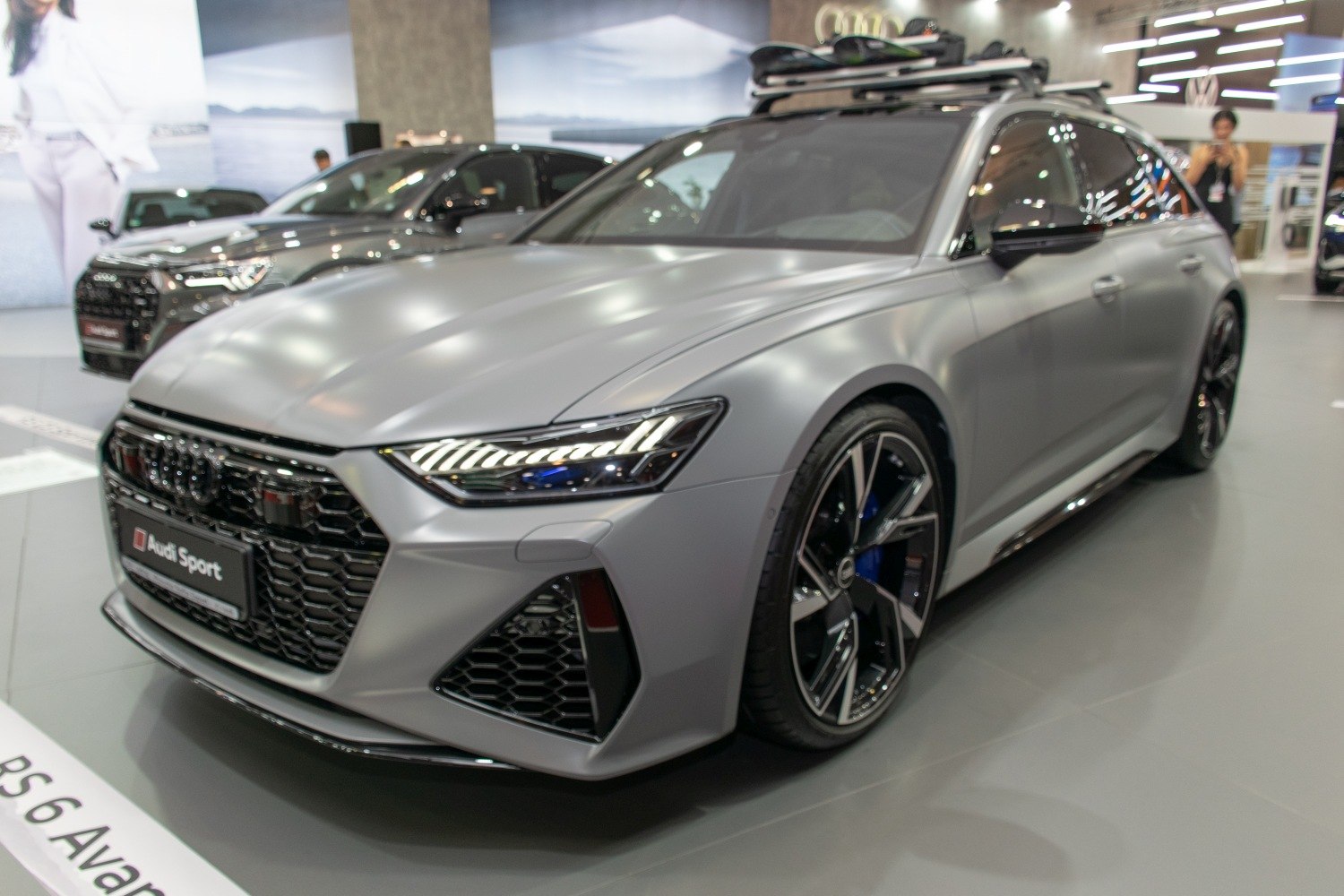 Matte gray luxury wagon with LED headlights and large alloy wheels