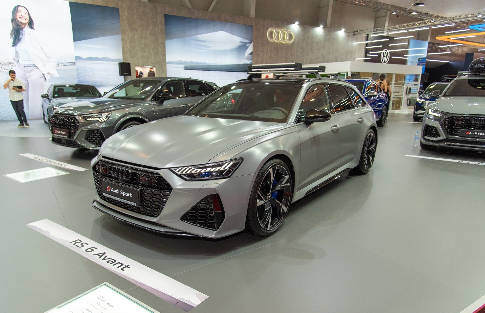 Sporty wide wagon with aggressive front grille and roof rails