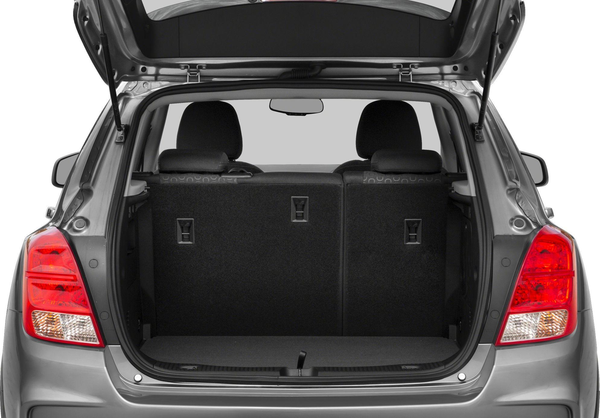 Open rear cargo area with back seats and hatch open