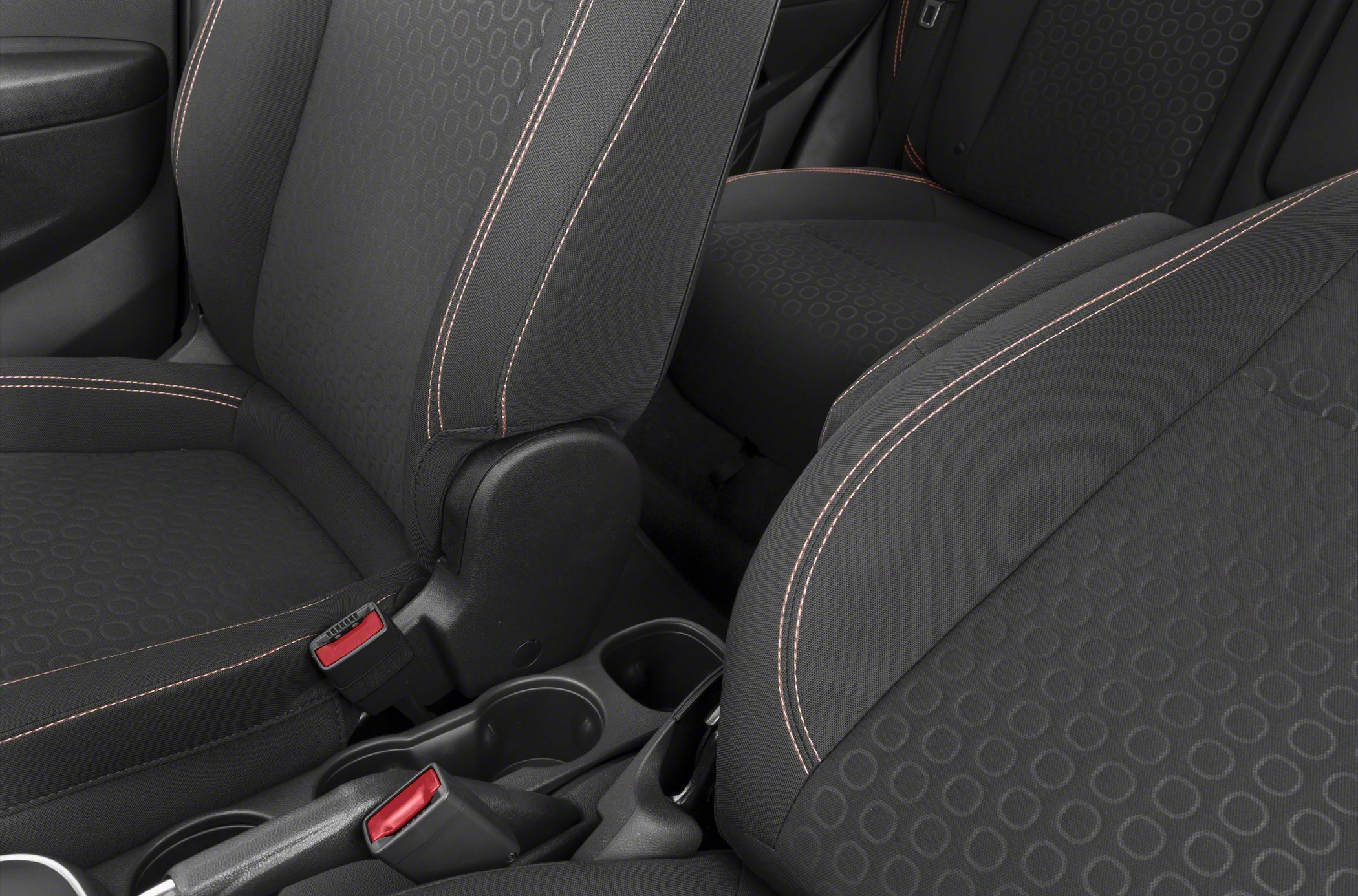 Fabric car seats with circular pattern and contrast stitching