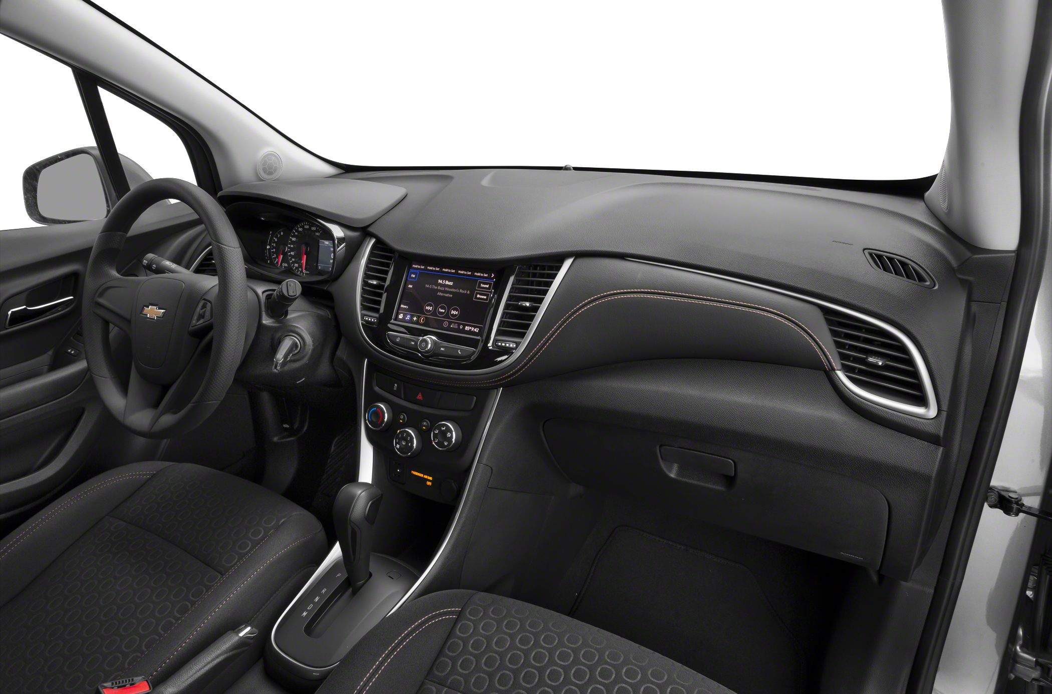 Dashboard, steering wheel, center console, and black cloth seats interior