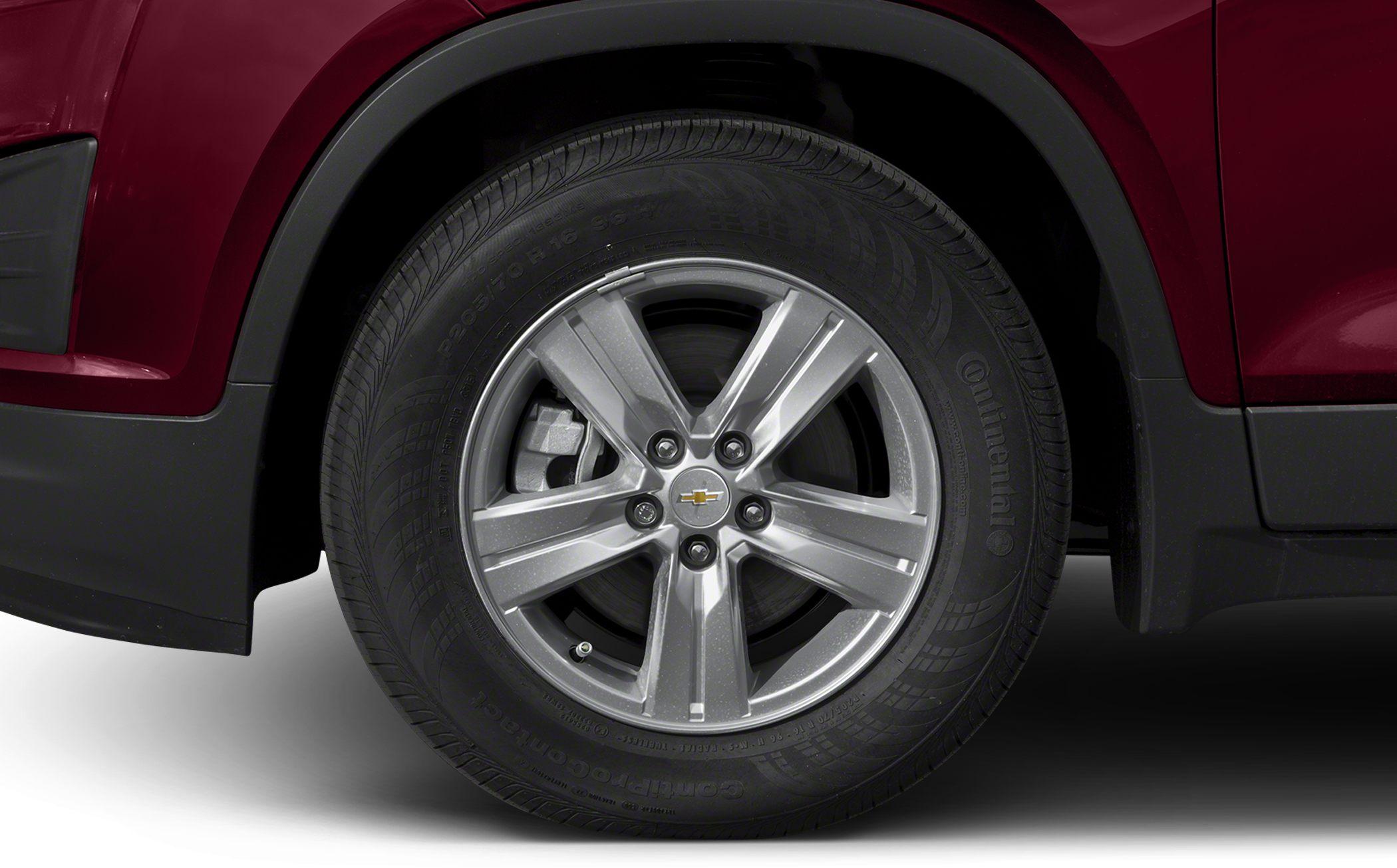 Close-up of silver five-spoke alloy wheel with Continental tire
