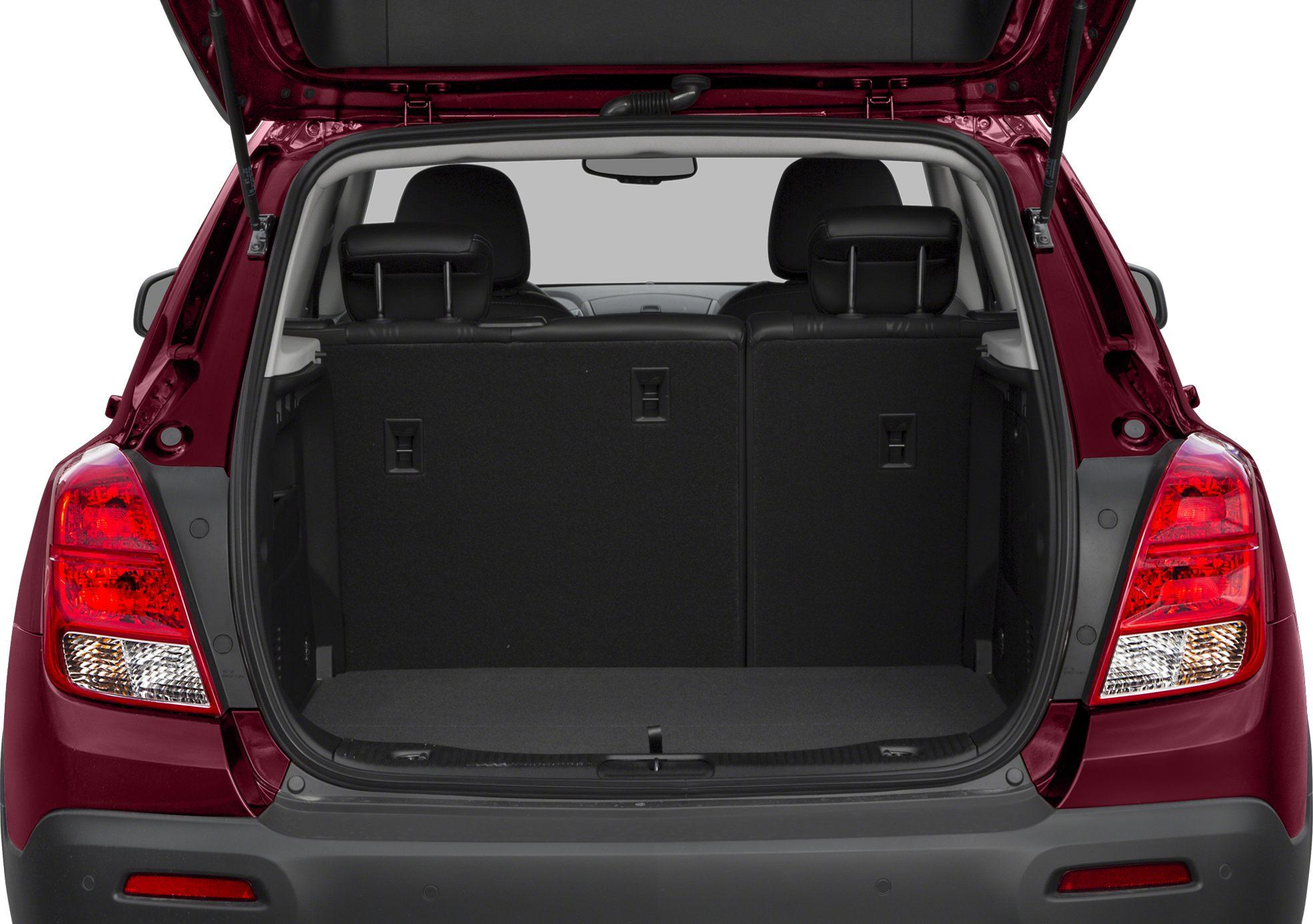 Open tailgate rear cargo area with back seats and headrests visible