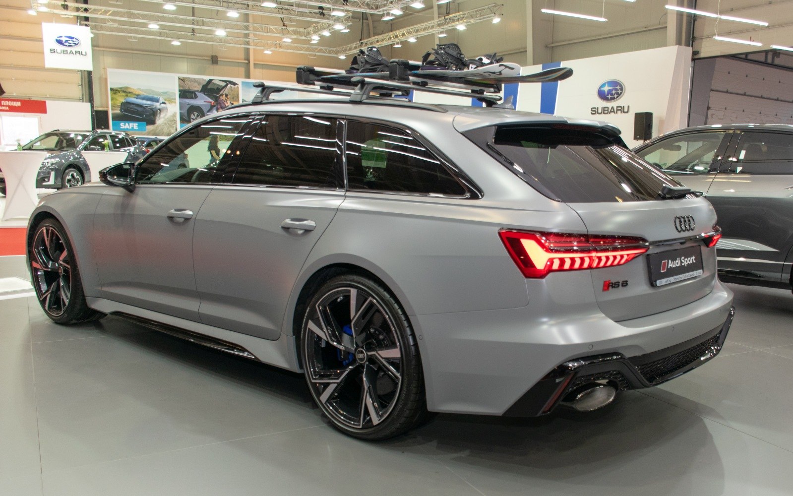 Matte gray sport wagon with roof ski rack and LED taillights